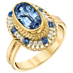 2.77 Carat Blue Sapphire, Seed Pearl, Sapphire Bead Yellow Gold Filigree Ring