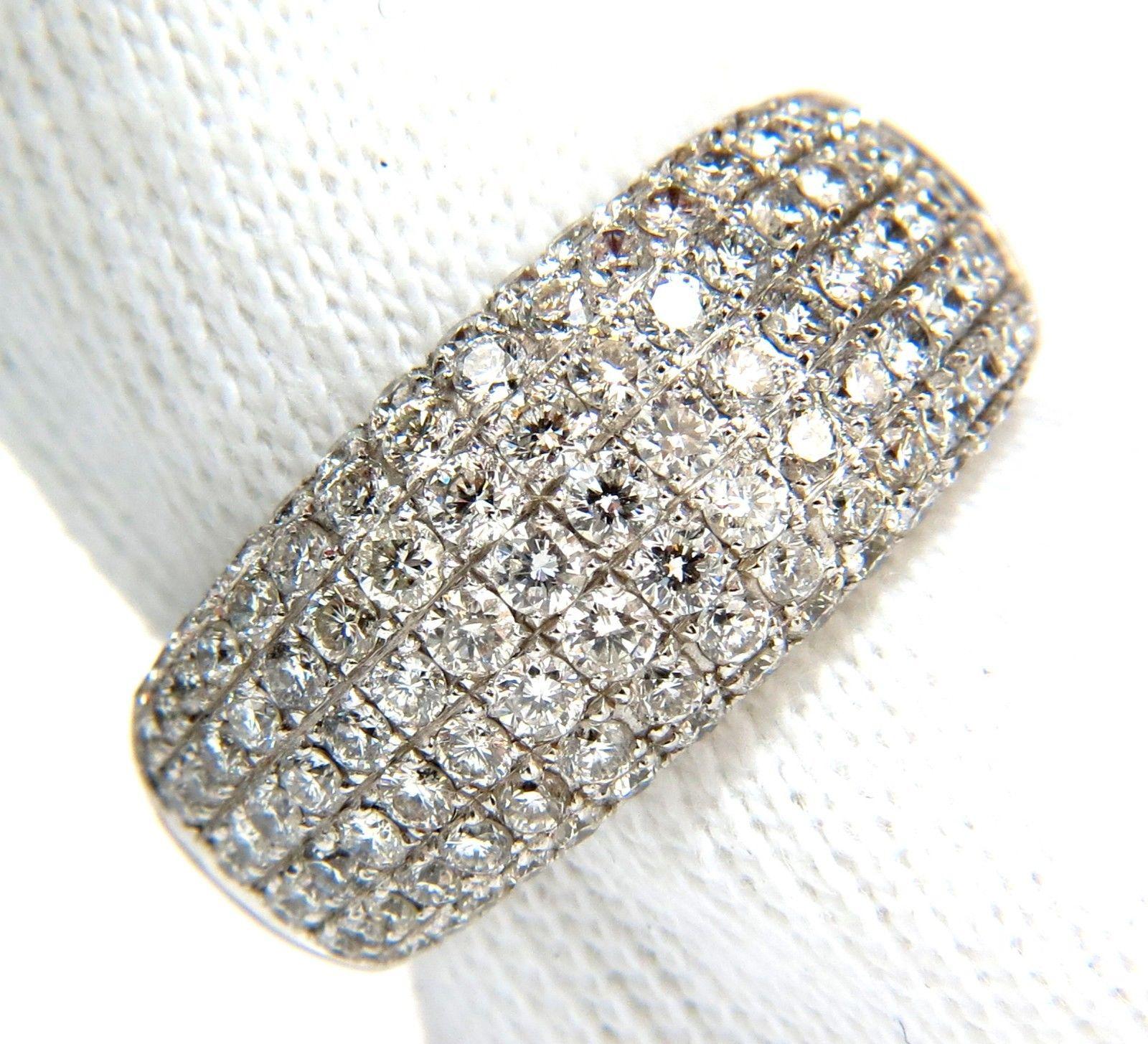 The wide comfort diamond band 

Amazing micro-set diamonds bring the rings to max sparkles

2.77ct diamonds

Rounds, Full cuts

Bead set

G color, Vs-2 clarity

18kt. white gold

9.2 Grams

ring is 10mm wide

Depth: 4.6mm

current size: 6.75 and can