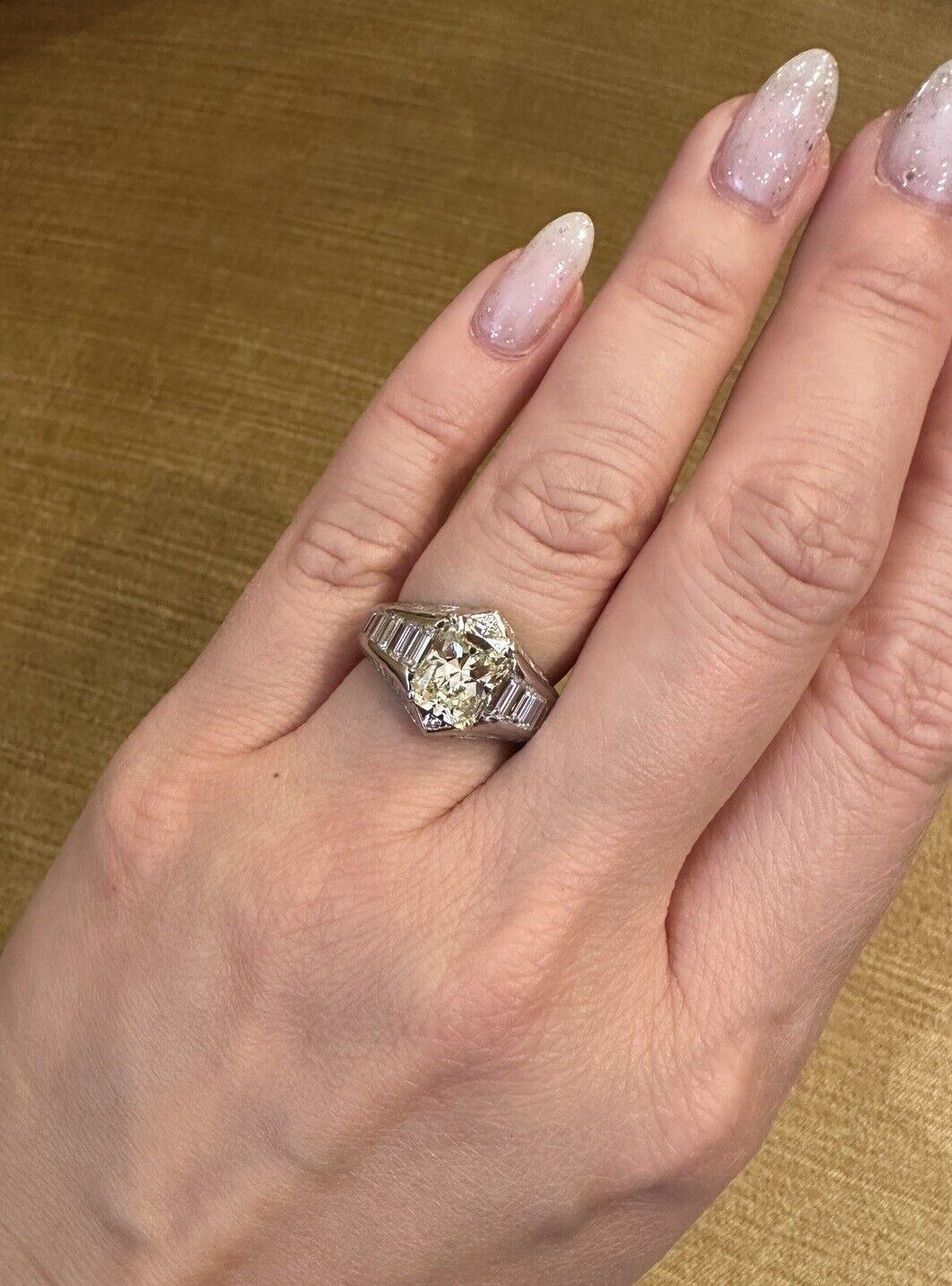 Radiant Cut Diamond Ring with Baguettes in Platinum

Radiant Diamond Ring features a natural light yellow color Center Radiant Cut Diamond with Baguette Diamonds channel set on three sides in Platinum.

Center Diamond weight is 2.77 carats.
The