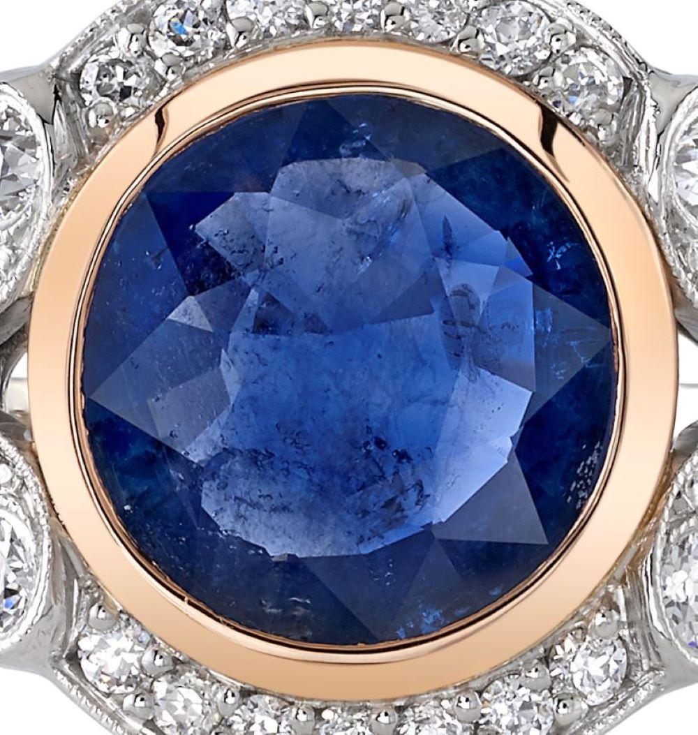 Women's 2.77 Carat Round Cut Blue Sapphire Set in a Rose Gold and Platinum Mounting.