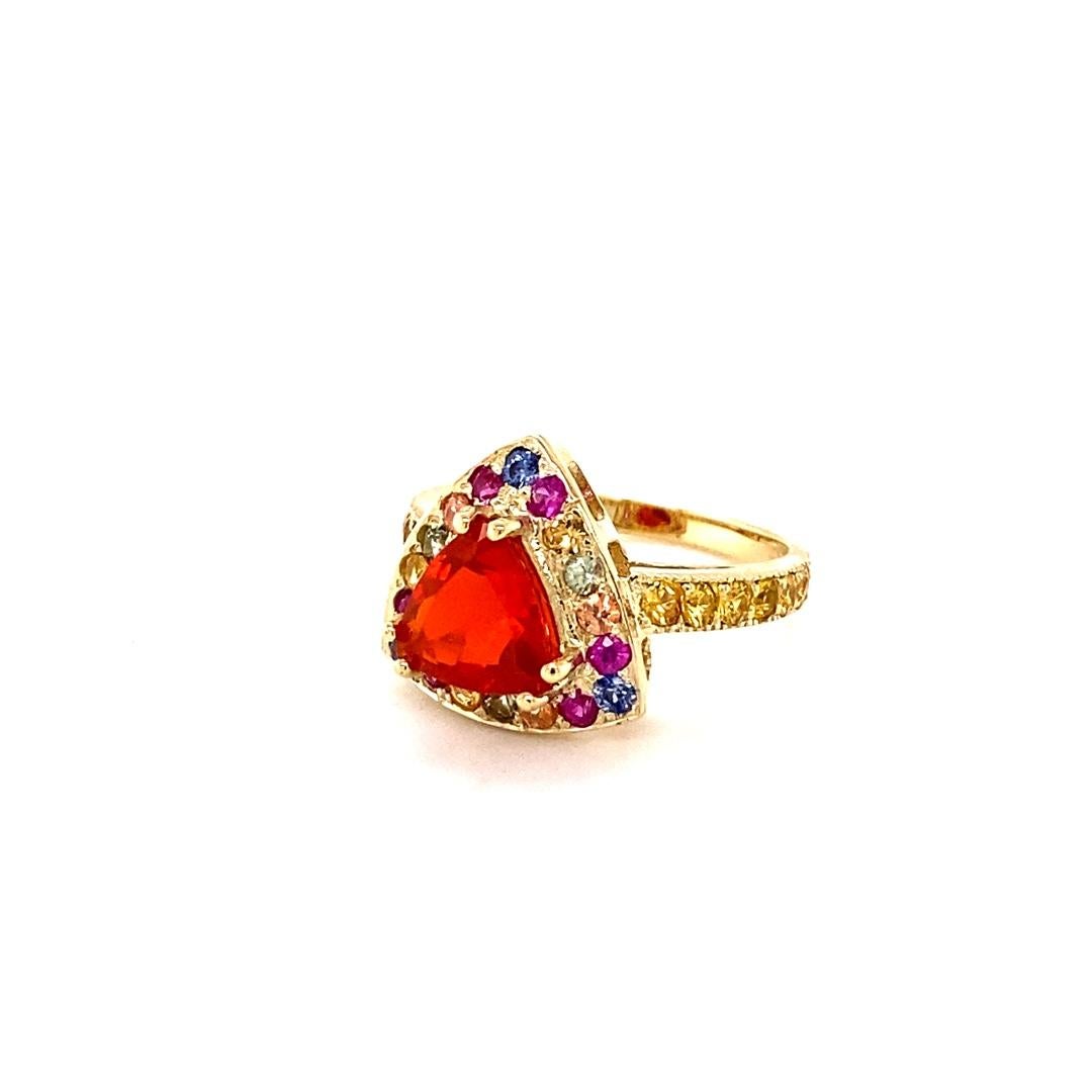 Contemporary 2.77 Carat Trillion Cut Fire Opal Sapphire Yellow Gold Cocktail Ring For Sale