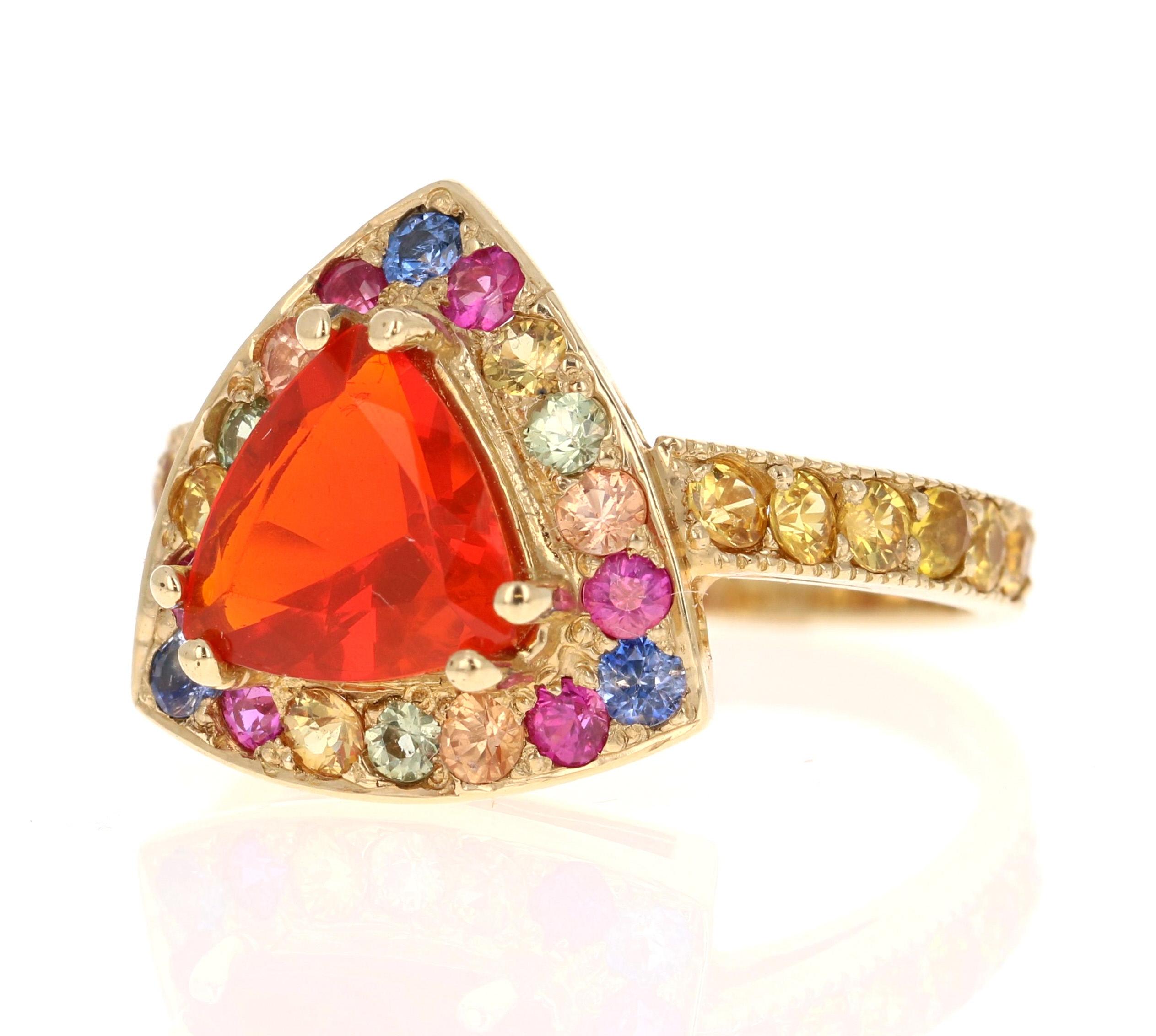 Contemporary 2.77 Carat Trillion Cut Fire Opal Sapphire Yellow Gold Cocktail Ring For Sale