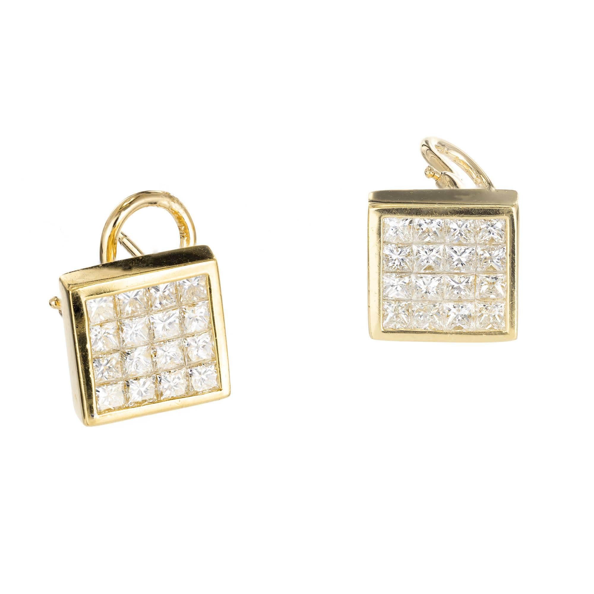 Classic flat invisible set Princess cut clip post diamond stud earrings with bright white sparkle, in 18k yellow gold. Lay flat and secure on the ear.

32 Princess cut diamonds, approx. total weight 2.77cts, F, VS2, 2.21 x 2.21
18k yellow gold
7.6