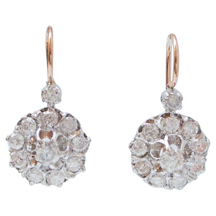 Orecchini con diamanti da 2,77 carati, in oro rosa e argento.