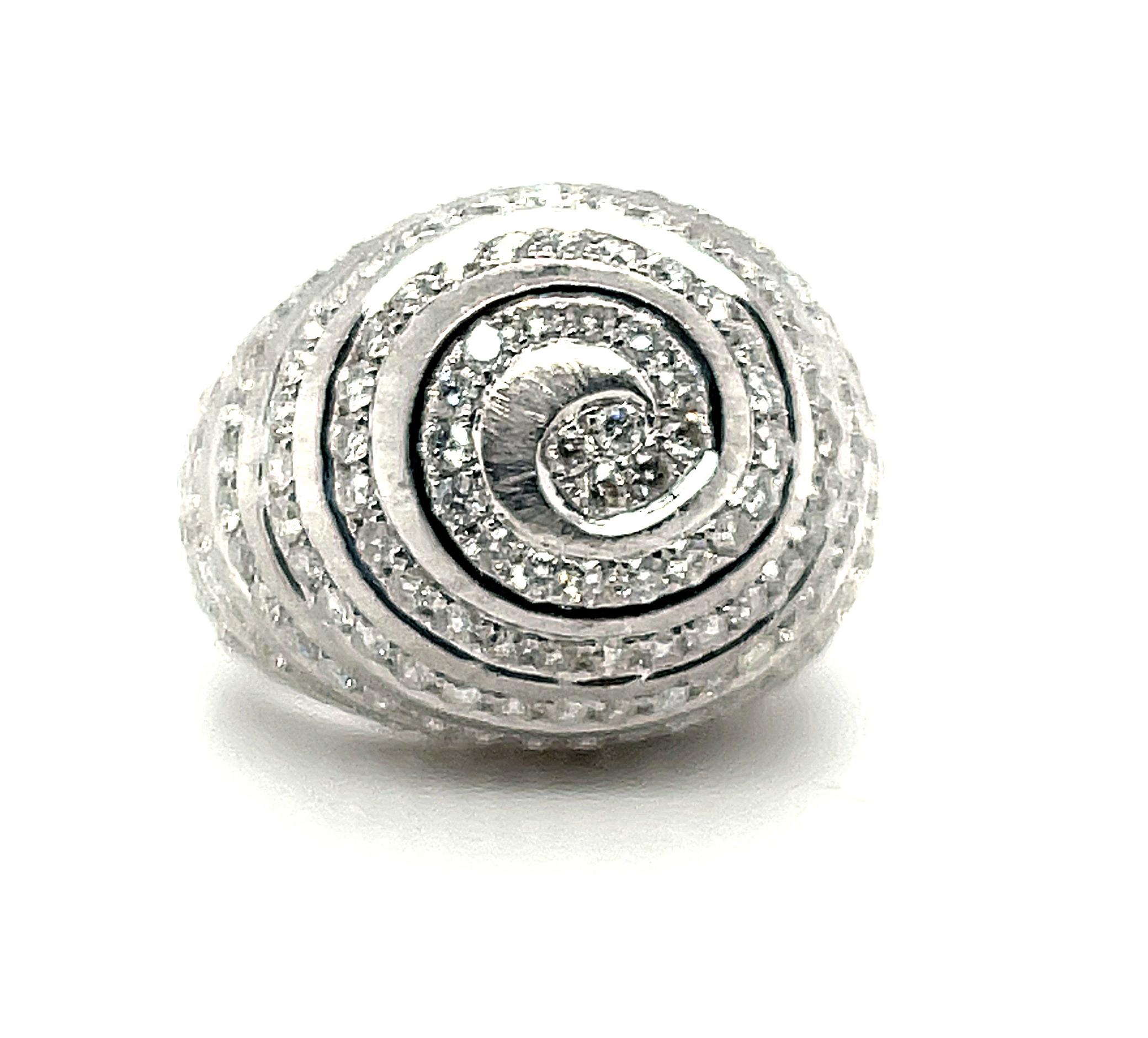 This Art Deco inspired dome ring features over two and a half carats of dazzling white diamonds set in 18k white gold spirals! It is a hypnotic design made up of gorgeous curves that will not go unnoticed - and neither will you! Make this your new