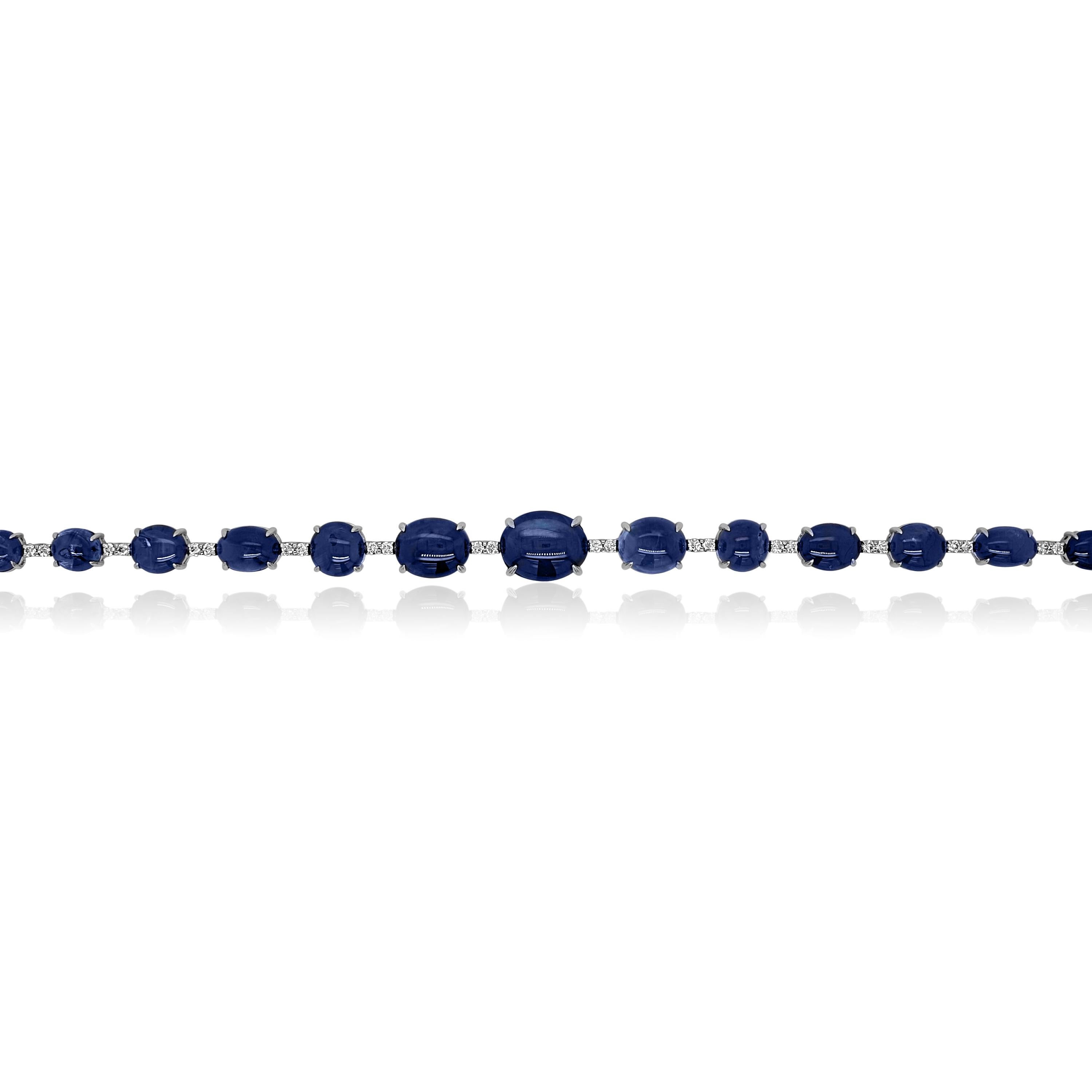 16 Sapphire Gemstones: 27.19 Carats
31 White Diamonds: 0.51 Carat, Round Cut
Metal: 18K White Gold, 9.70 Grams