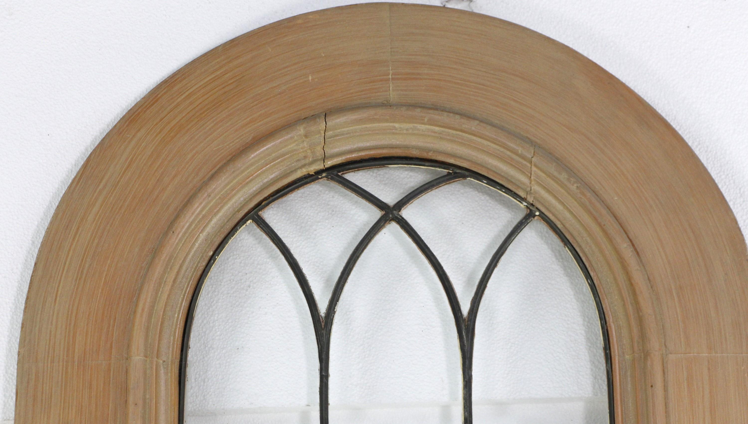 arched front door with glass