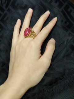 27.78 Carat Cabochon Pink Rubellite 18K Gold Ring with Diamond and Blue Sapphire