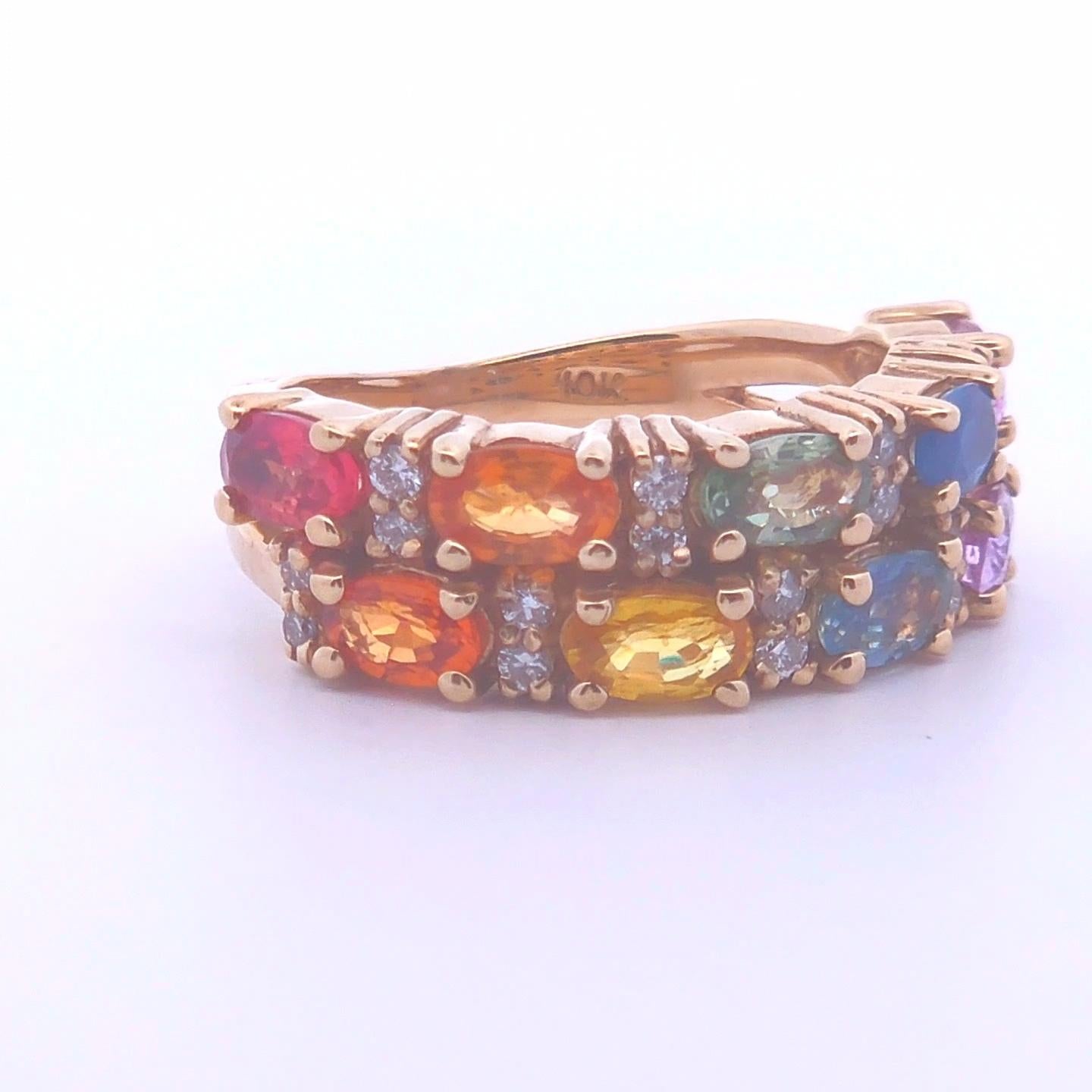 This exquisite 2.77ctw Oval Sapphire Ring in 10k Gold is a true masterpiece, showcasing a captivating blend of vibrant colors. Featuring multiple 2.54ct oval sapphires in an array of rich, multicolor hues, this ring dazzles with its unique and