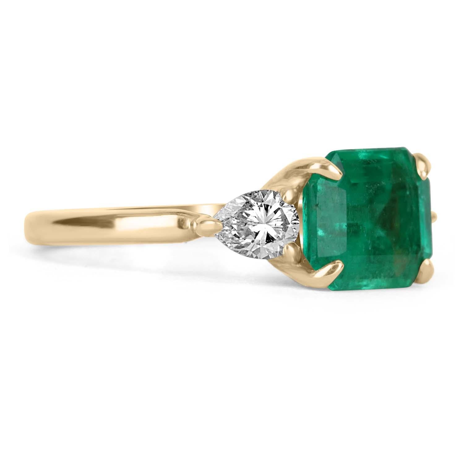 Featured is a Colombian emerald and diamond three-stone engagement or right-hand ring. An extraordinary custom-created ring made by JR Colombian Emeralds. Dexterously crafted in gleaming 18K gold, this ring displays a 2.17-carat natural Colombian