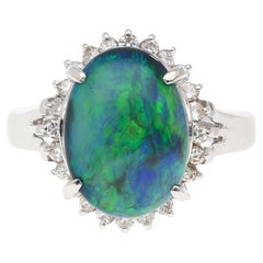 Vintage 2.78 Carat Black Opal and Diamond Halo Platinum Filigree Ring
