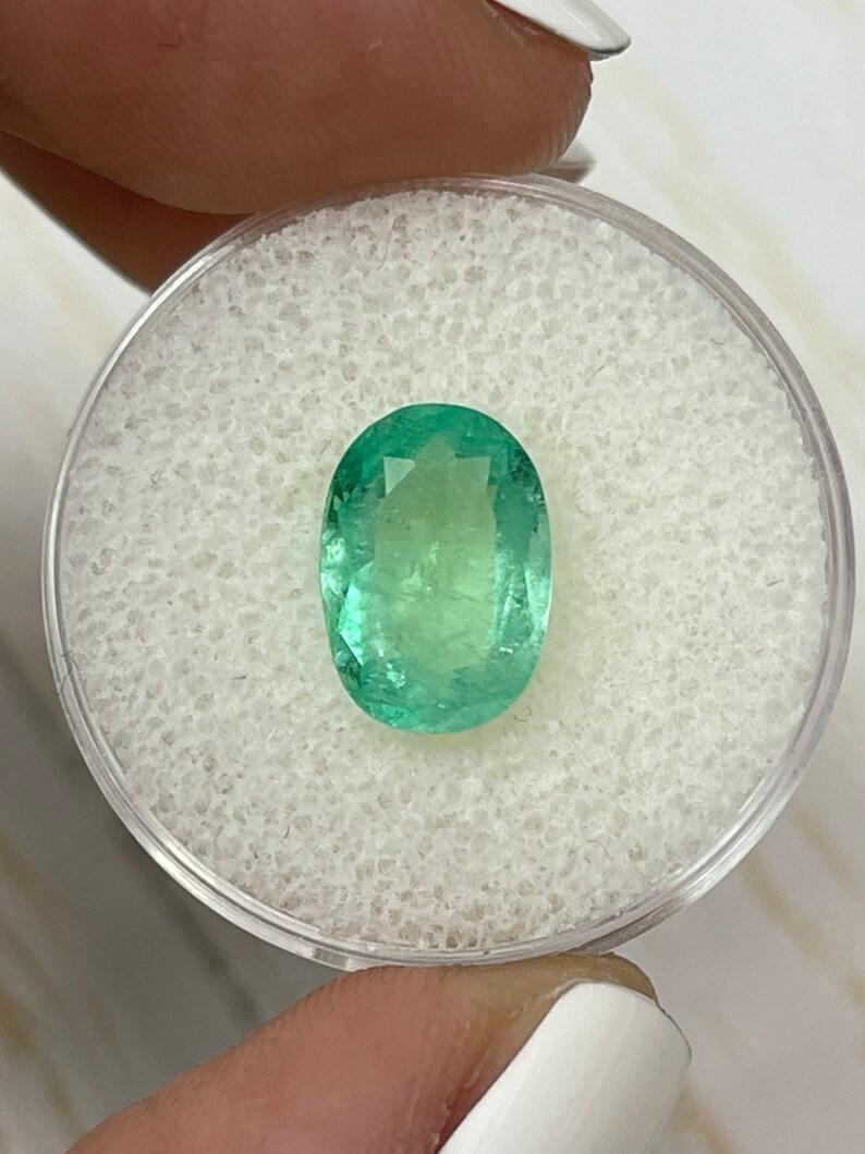 2.78 Carat Light Yellowish Green Colombian Emerald Oval Cut - May Birthstone Gem For Sale 1