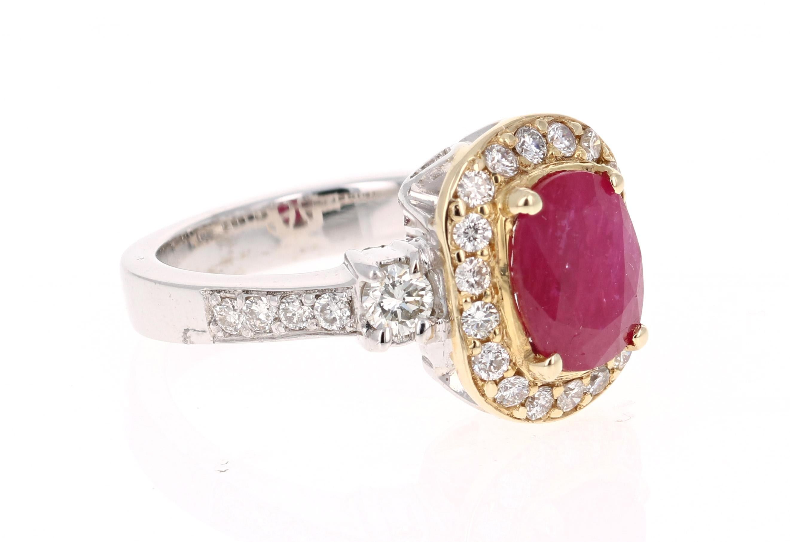 2.78 Carat Ruby and Diamond Bridal Ring in 14K White Gold!

This ring has a beautiful Natural Oval Cut Ruby that weighs 2.03 Carats and is surrounded by 28 Round Cut Diamonds that weigh 0.75 carats.  The total carat weight of the ring is 2.78