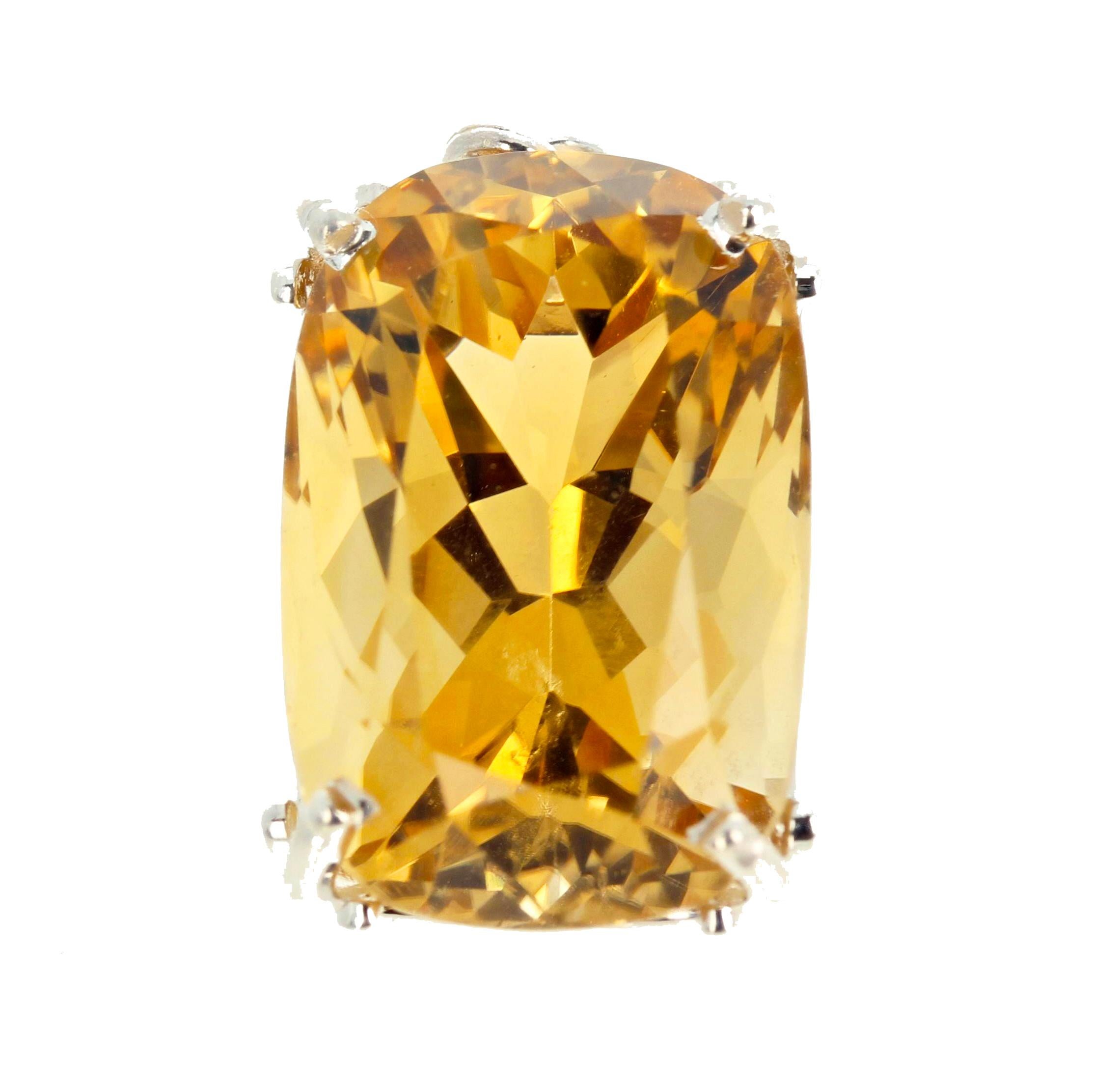 Glittering yellow goldy cushion cut 27.85 carat Madagascar Citrine - 22 mm x 16 mm - set in this lovely sterling silver pendant that hangs approximately 1 1/2 inches long.  