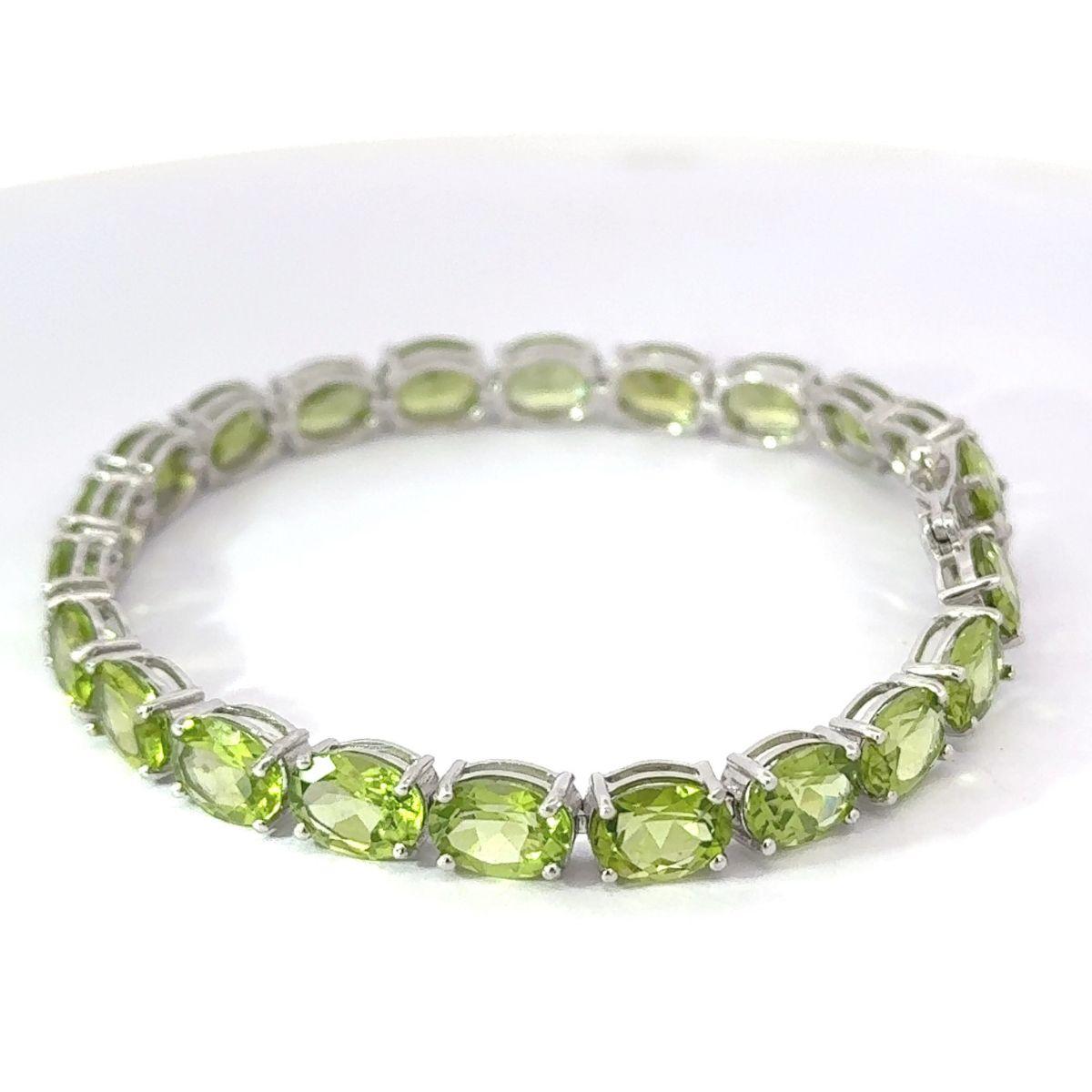 27,85 carati di peridoto taglio ovale in argento 925 Bracciale da tennis per mamma regalo in vendita 3