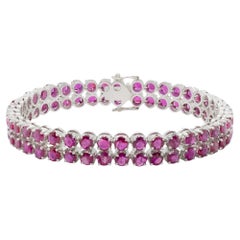 Bracelet tennis en or blanc 18 carats avec rubis de 27,88 carats