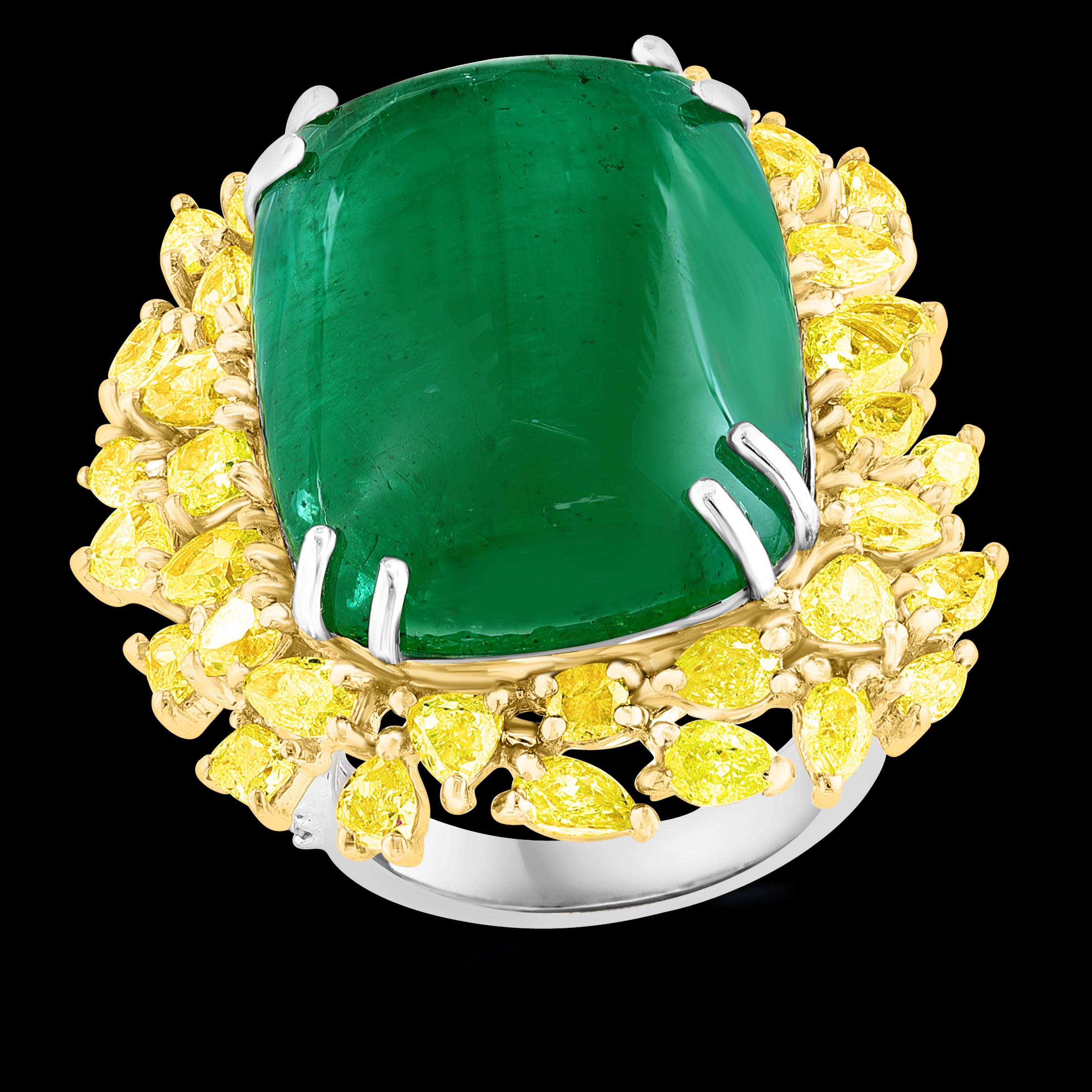 A classic, Cocktail ring 
27.89 Ct Natural Colombian Emerald Cabochon & 5.73 Ct  Yellow Diamond Ring 18 Karat two tone gold 
Exact  27.89  Carat Natural Cabochon Emerald Ring set in 18 Karat Yellow and white  Gold with 5.73 ct of yellow diamonds