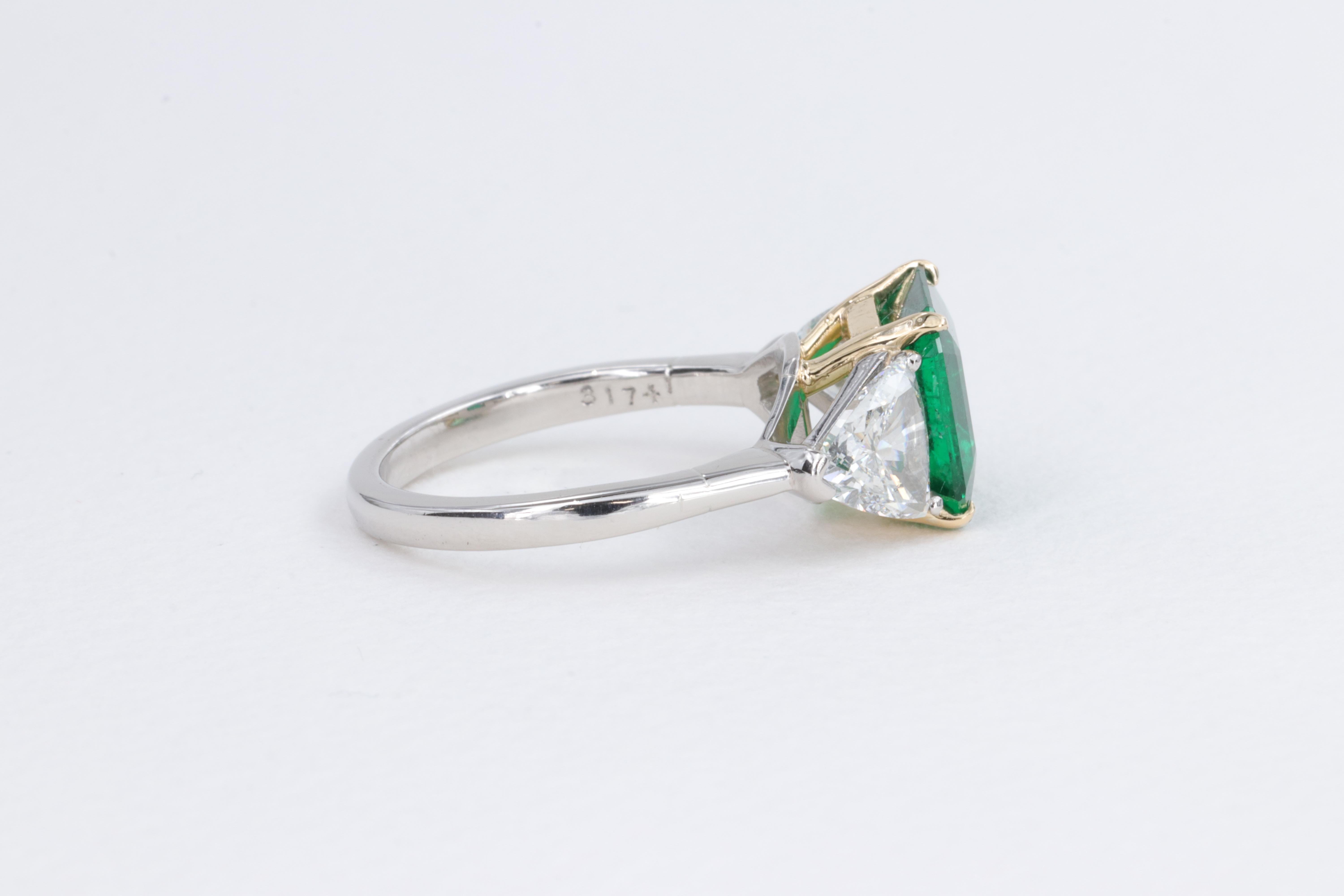 Women's or Men's 2.78ct Minor Oil Emerald A.G.L. Three Stone Ring with G.I.A. Trillions