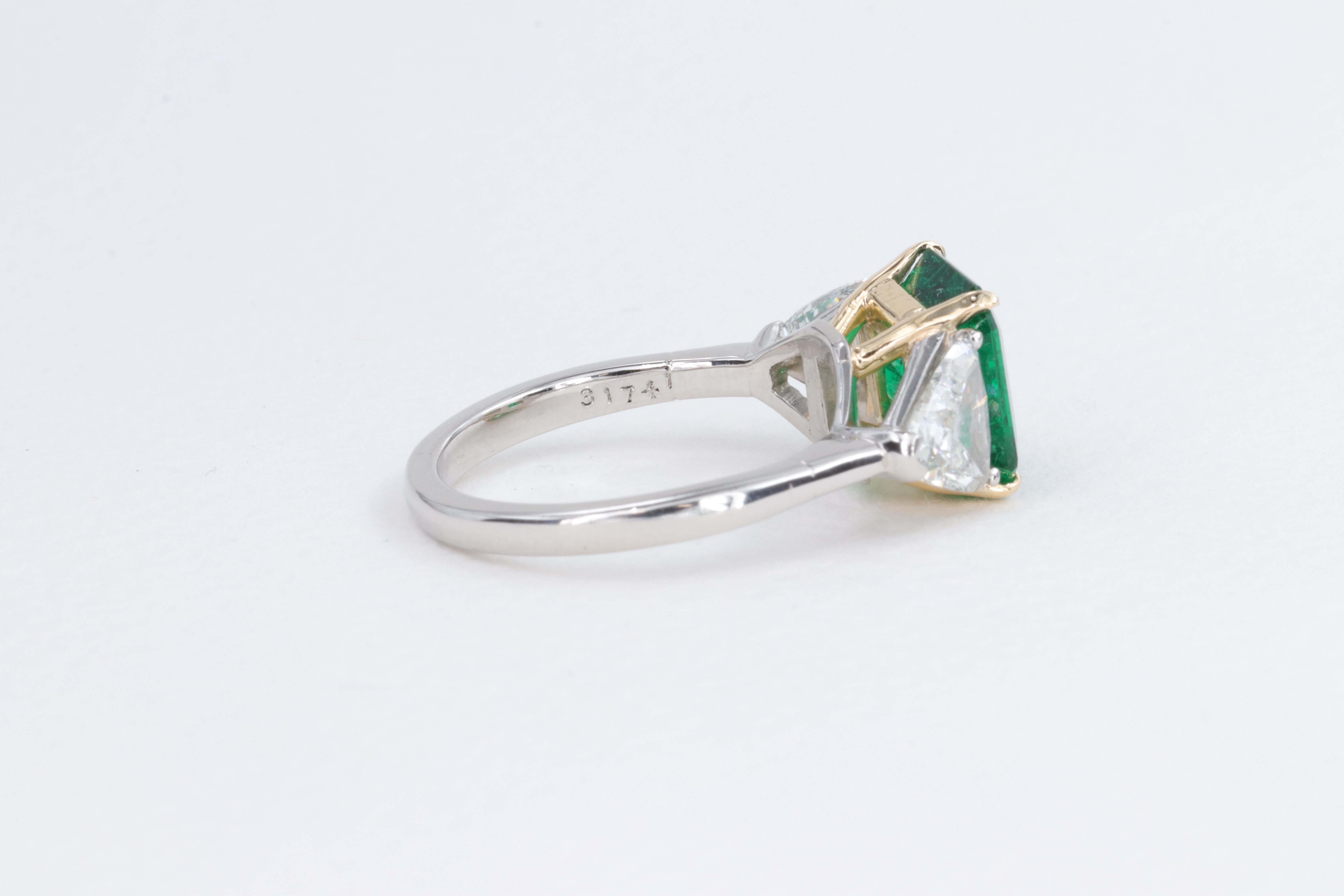 2.78ct Minor Oil Emerald A.G.L. Three Stone Ring with G.I.A. Trillions 1