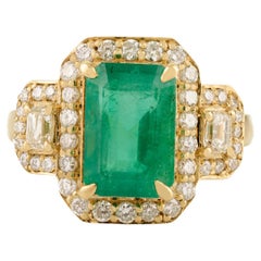 2.78Ct Octagon Cut Emerald Cocktail Ring with Halo Diamonds in 14K Yellow Gold