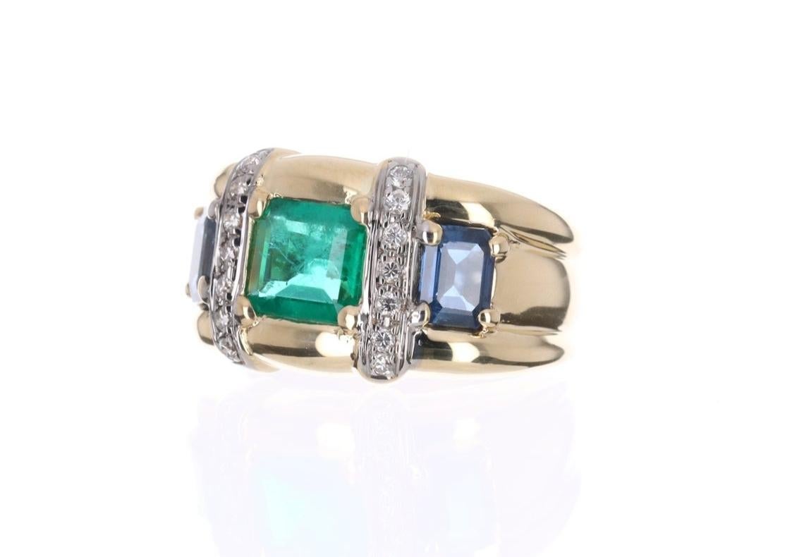 Setting Style: Three-Stone
Setting Material: 18K Yellow Gold
Gold Weight: 8.1 Grams

Main Stone: Emerald
Shape: Emerald Cut
Approx Weight: 1.04-carats
Color: Green
Clarity: Semi-Transparent
Luster: Excellent
Origin: Colombia
Treatments: