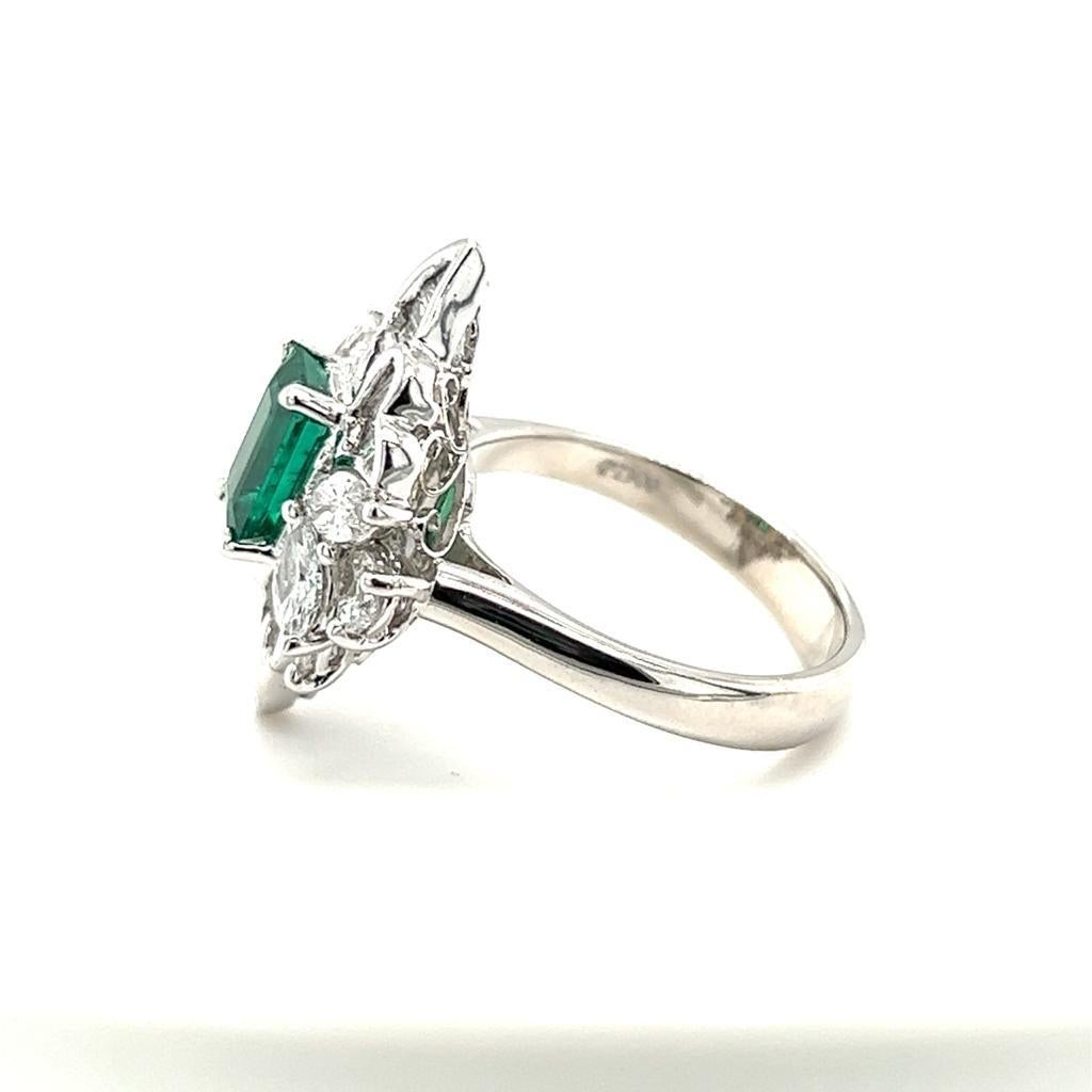 This is a classy Emerald and Diamond Ring weighing 2.79 carats in total.  Our craftsman has set the gorgeous Emerald as the centre stone weighing 1.13 carats surrounded by various shape of diamonds weighing 1.66 carats on Platinum (PT900). The