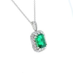 2.79 Carat Emerald Shape Green Emerald & Diamond Pendants In 18k White Gold