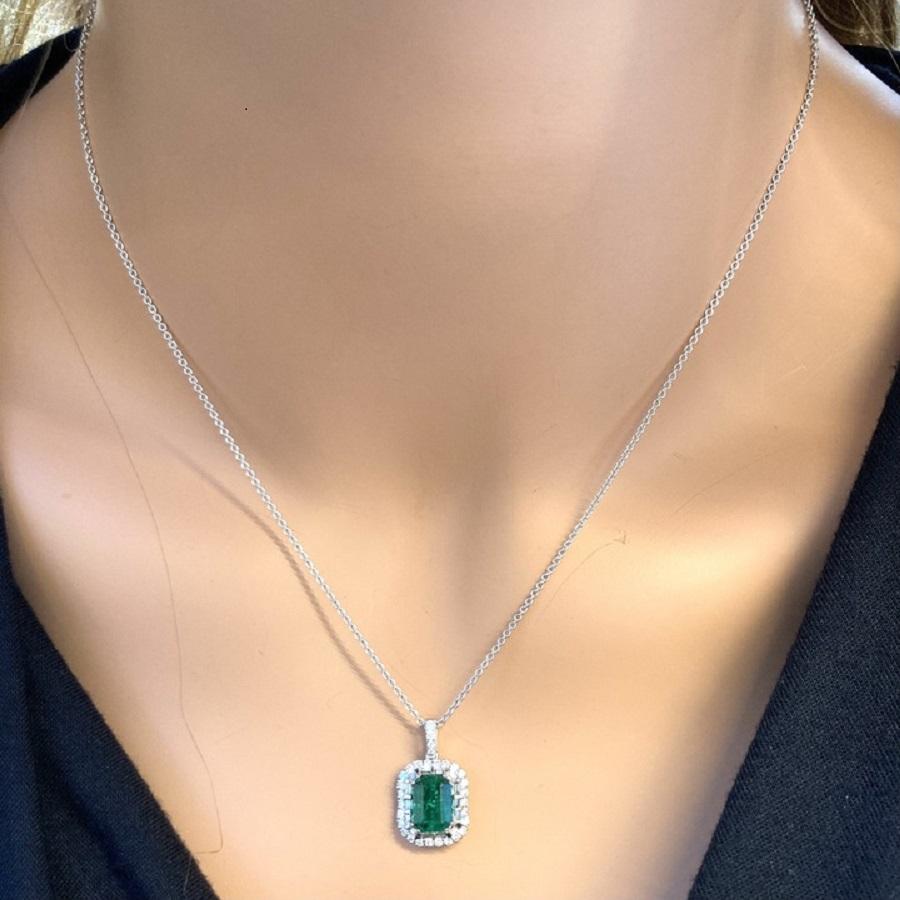 Emerald Cut 2.79 Carat Emerald Shape Green Emerald & Diamond Pendants In 18k White Gold  For Sale