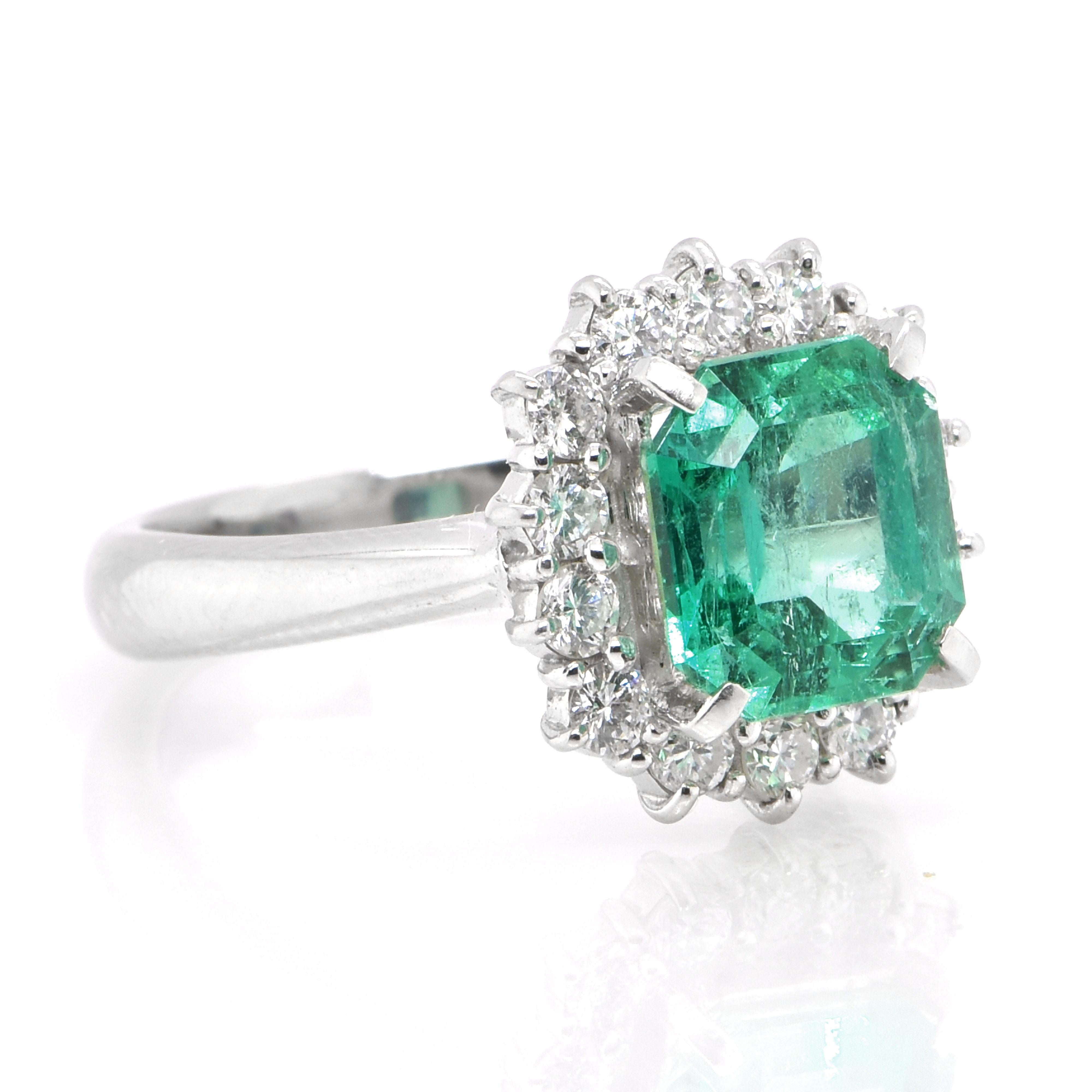 Modern 2.79 Carat Natural Colombian Emerald and Diamond Halo Ring Set in Platinum