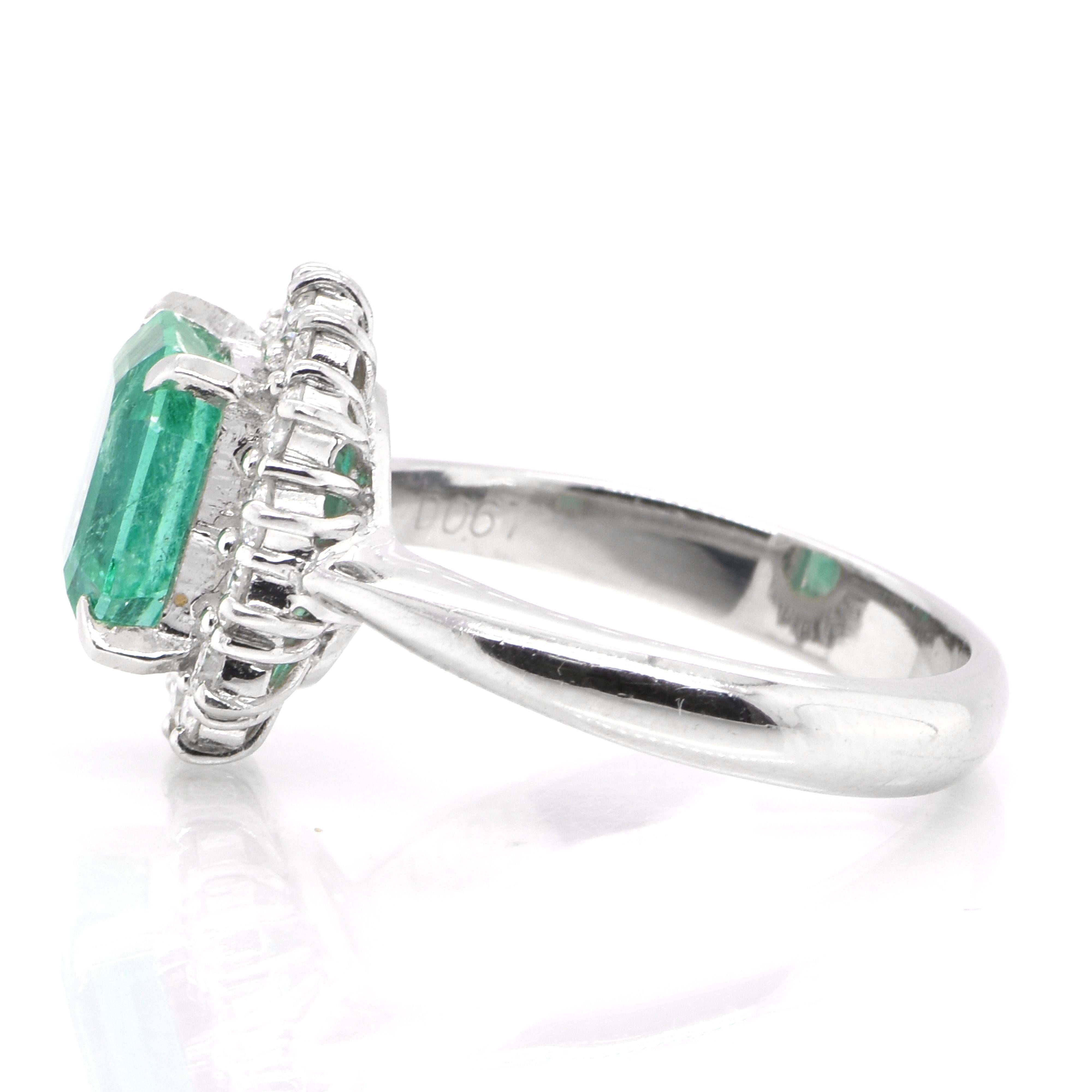 Emerald Cut 2.79 Carat Natural Colombian Emerald and Diamond Halo Ring Set in Platinum
