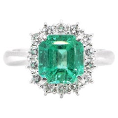 2.79 Carat Natural Colombian Emerald and Diamond Halo Ring Set in Platinum
