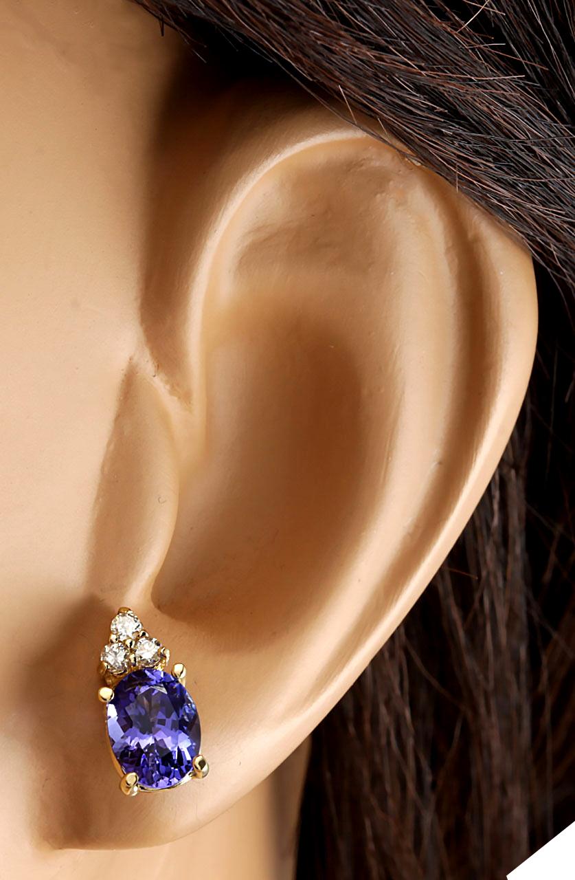 Oval Cut Natural Tanzanite Diamond Earrings In 14 Karat Yellow Gold  For Sale