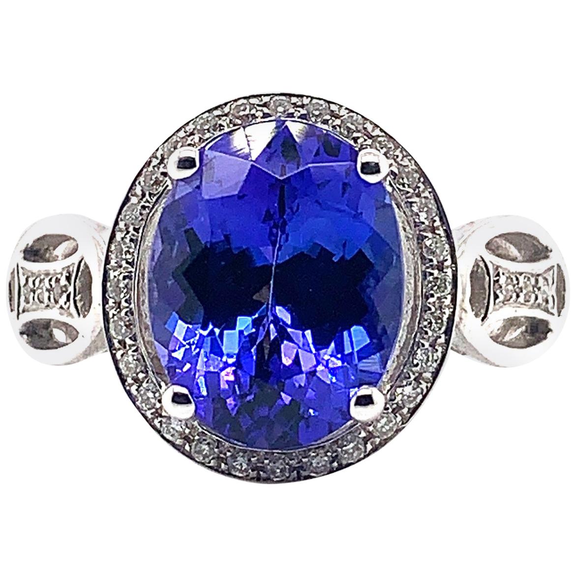 2.790 Carat Oval Shaped Tanzanite Ring in 18 Karat White Gold with Diamonds For Sale
