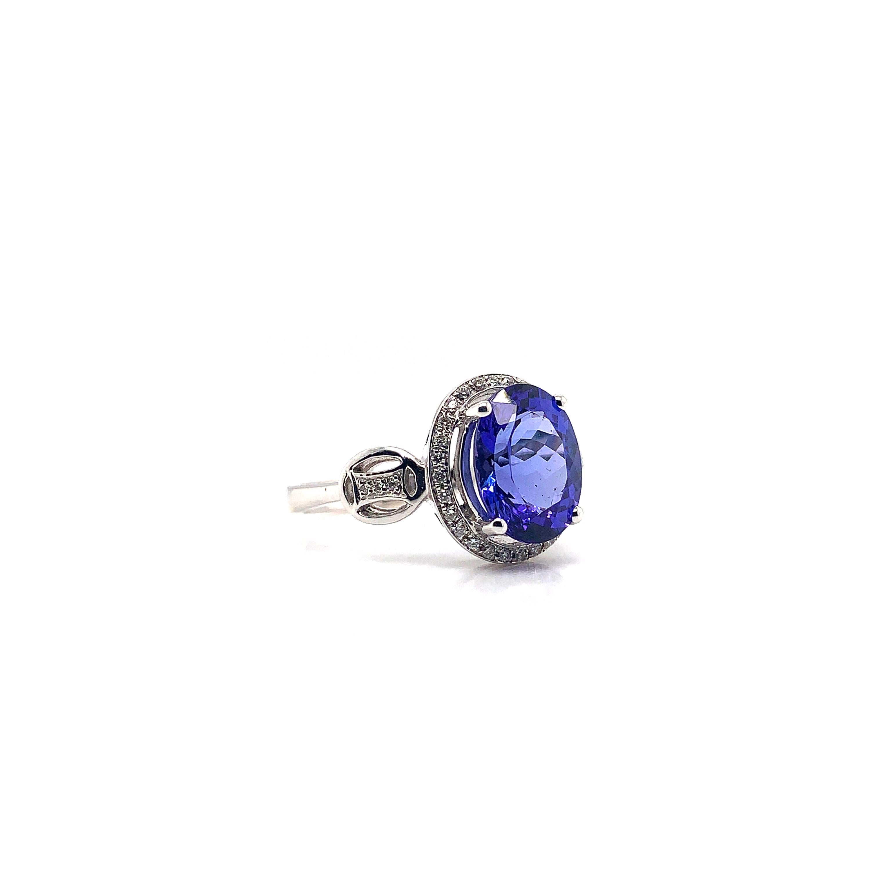 Oval Cut 2.790 Carat Oval Shaped Tanzanite Ring in 18 Karat White Gold with Diamonds For Sale