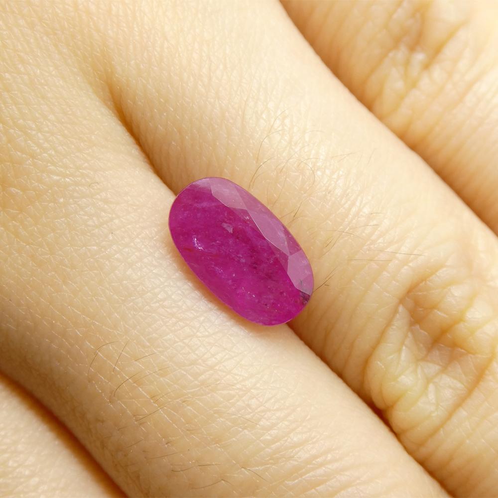 Description:

Gem Type: Ruby 
Number of Stones: 1
Weight: 2.7 cts
Measurements: 10.69 x 6.30 x 4.19 mm
Shape: Oval
Cutting Style Crown: Brilliant Cut
Cutting Style Pavilion: Step Cut 
Transparency: Semi-Translucent
Clarity: Moderately Included: