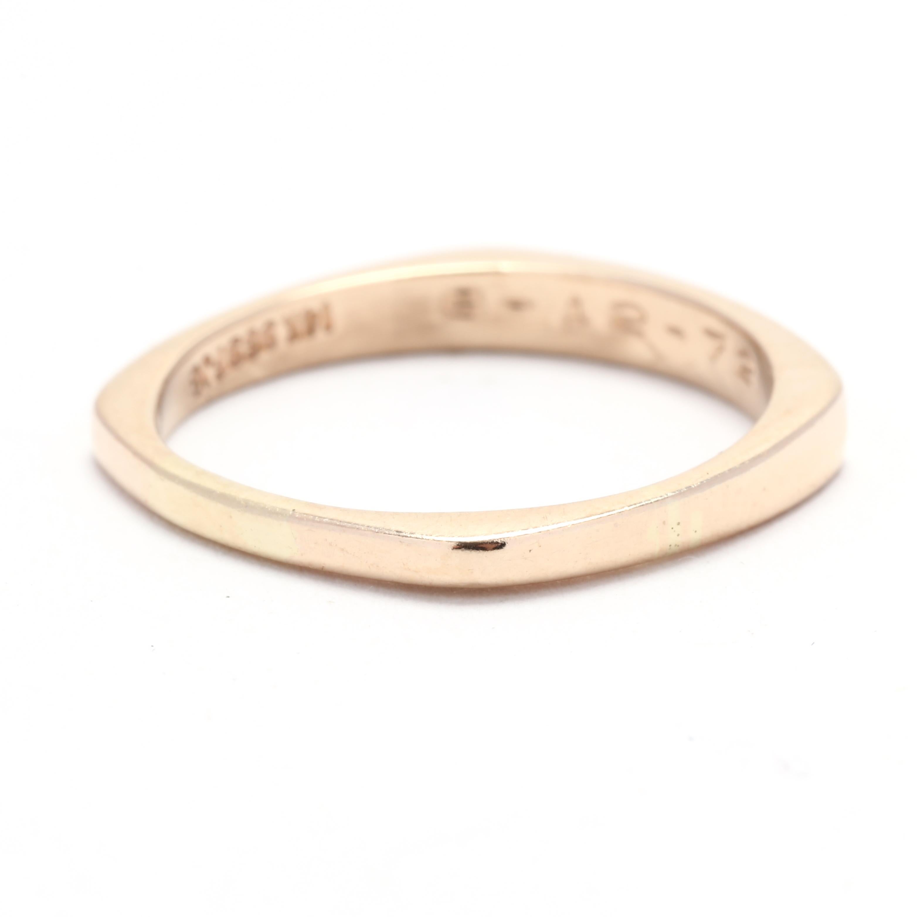 This ring is designed to be stackable, allowing you to effortlessly pair it with other rings to create a personalized and unique look. Whether you choose to wear it as a standalone symbol of commitment or combine it with other bands, this versatile