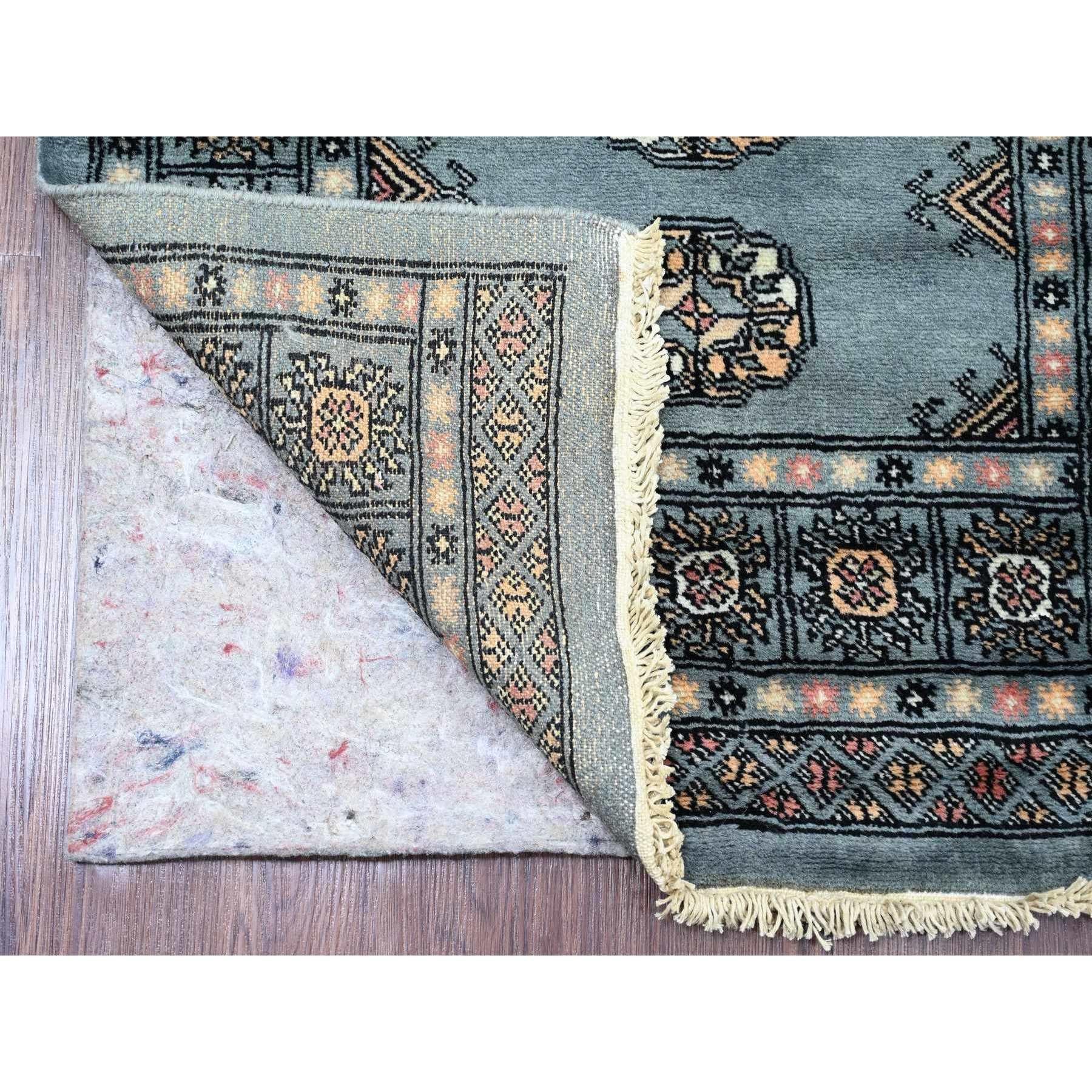 Misty Gray, Soft Wool, Mori Bokara with Geometric Medallions Design, Hand Knotted, Runner, Oriental Rug
Primary materials: Wool
Latex: No Pile 
height: 0.25 Inches
Style: Traditional
Primary color: Grey
Secondary colors: Peach, Ivory, Black
Pattern: