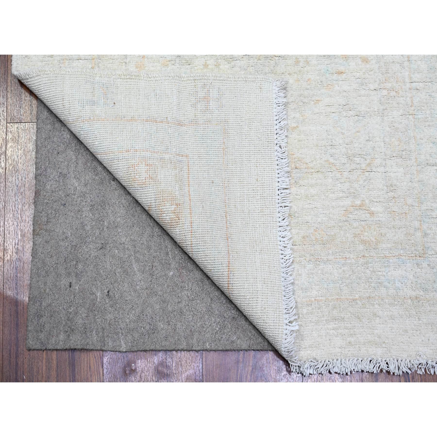White Wash Peshawar with Faded Colors Vegetable Dyes, 100% Wool Hand Knotted, Runner Oriental Rug
Primary materials: Wool
Latex: No Pile 
height: 0.25 Inches
Style: Transitional
Primary color: Ivory
Secondary colors: Light Blue
Pattern: Oriental