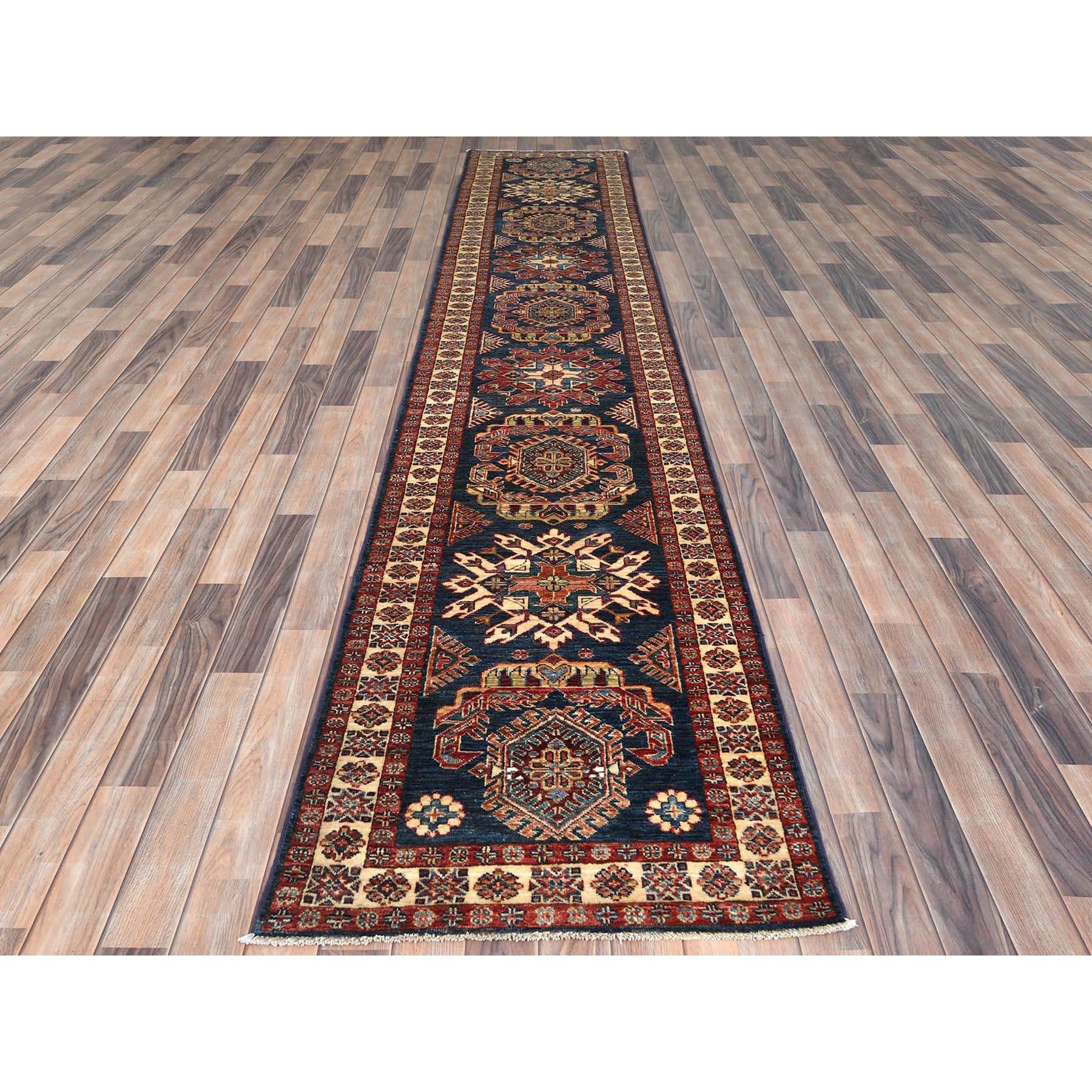Space Cadet, Afghan Super Kazak Natural Dyes, Pure Wool Hand Knotted, Runner Oriental Rug
Primary materials: Wool
Latex: No Pile 
height: 0.25 Inches
Style: Traditional
Primary color: Blue
Secondary colors: Red, Green, Orange, Brown
Pattern: Oriental