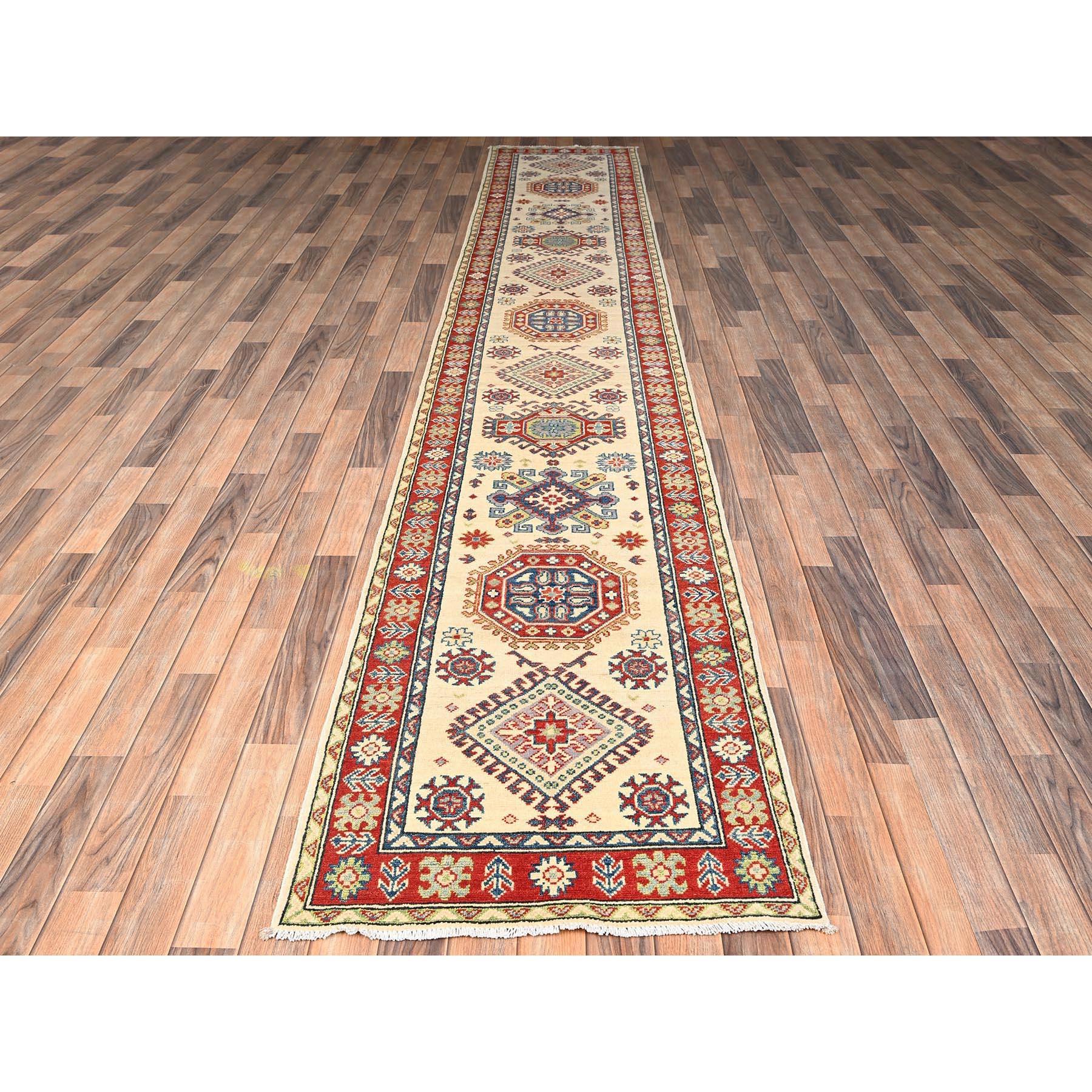 Island Spice White, Hand Knotted, Organic Wool, Vegetable Dyes, Denser Weave, Kazak with Geometric Medallions Design, XL, Runner, Oriental Rug
Primary materials: Wool
Latex: No Pile 
height: 0.25 Inches
Style: Traditional
Primary color: