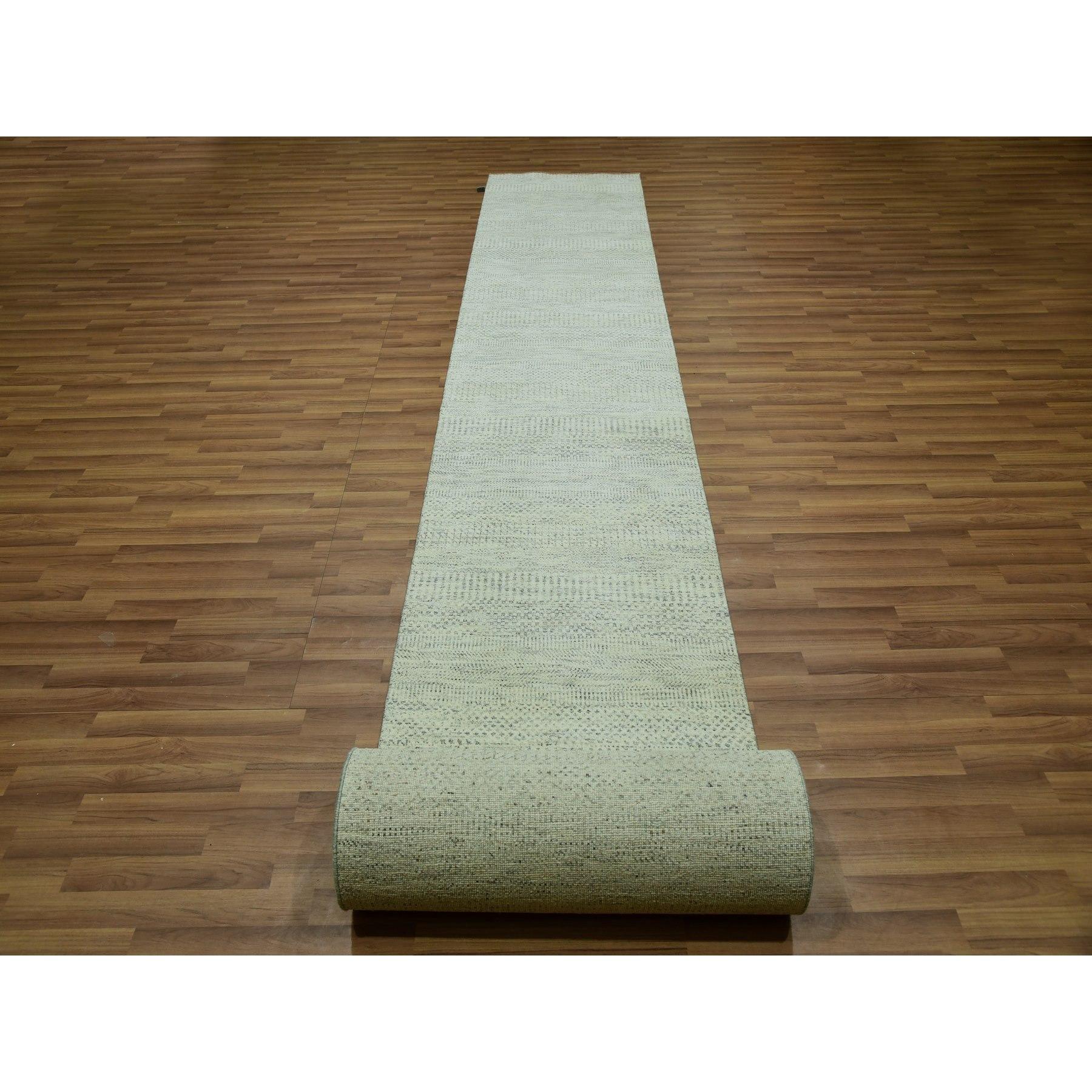 This is a truly genuine one-of-a-kind Modern Grass Design, Pure Wool, Tone on Tone, Hand Knotted, Oriental Rug. It has been Knotted for months and months in the centuries-old weaving craftsmanship techniques by artisans.
Primary materials:
