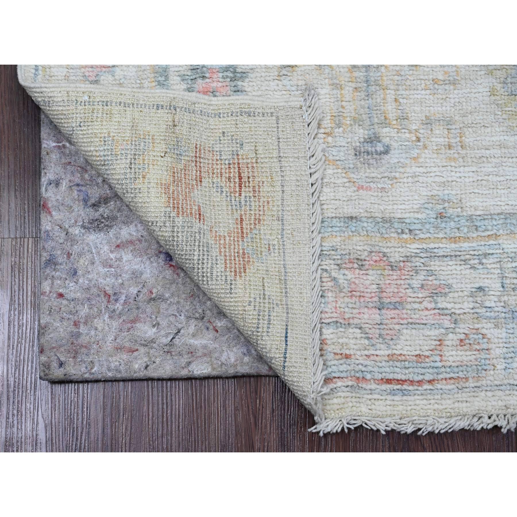 Bone White, 100% Wool, Afghan Angora Oushak with Geometric Leaf Design, Hand Knotted, Vegetable Dyes, Runner, Oriental Rug
Primary materials: Wool
Latex: No Pile 
height: 0.25 Inches
Style: Transitional
Primary color: Ivory
Secondary colors: Blue,