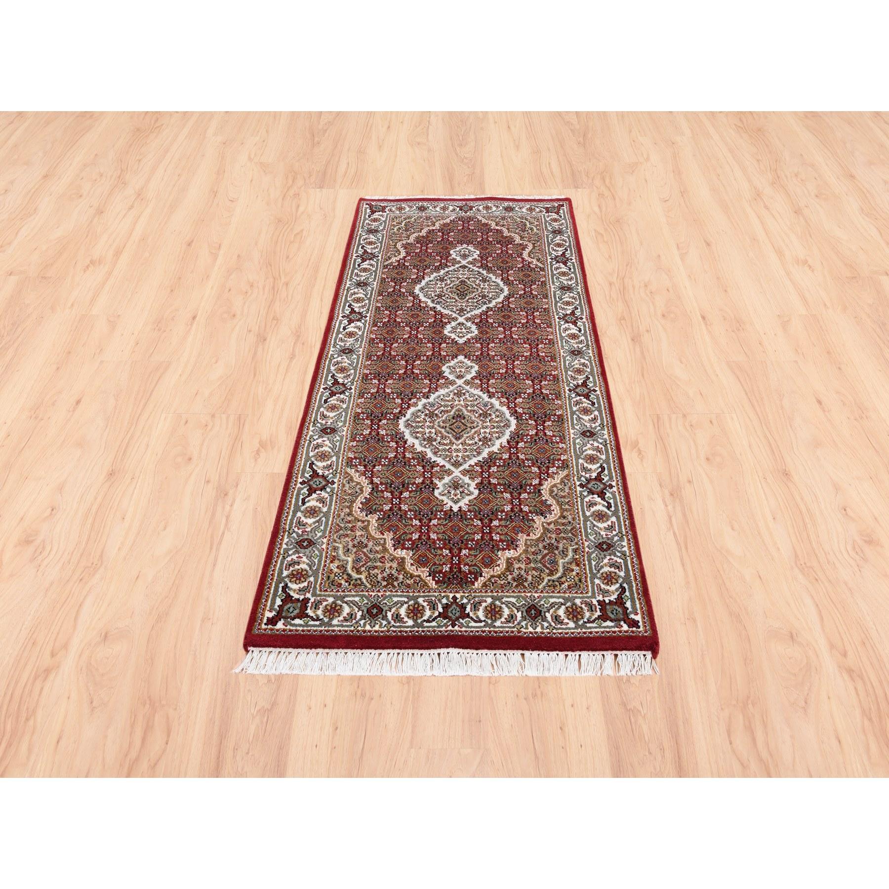 This is a truly genuine one-of-a-kind Hand Knotted Red Tabriz Mahi Fish Medallion Design Wool Oriental Runner Rug. It has been Knotted for months and months in the centuries-old Persian weaving craftsmanship techniques by expert artisans.
Primary