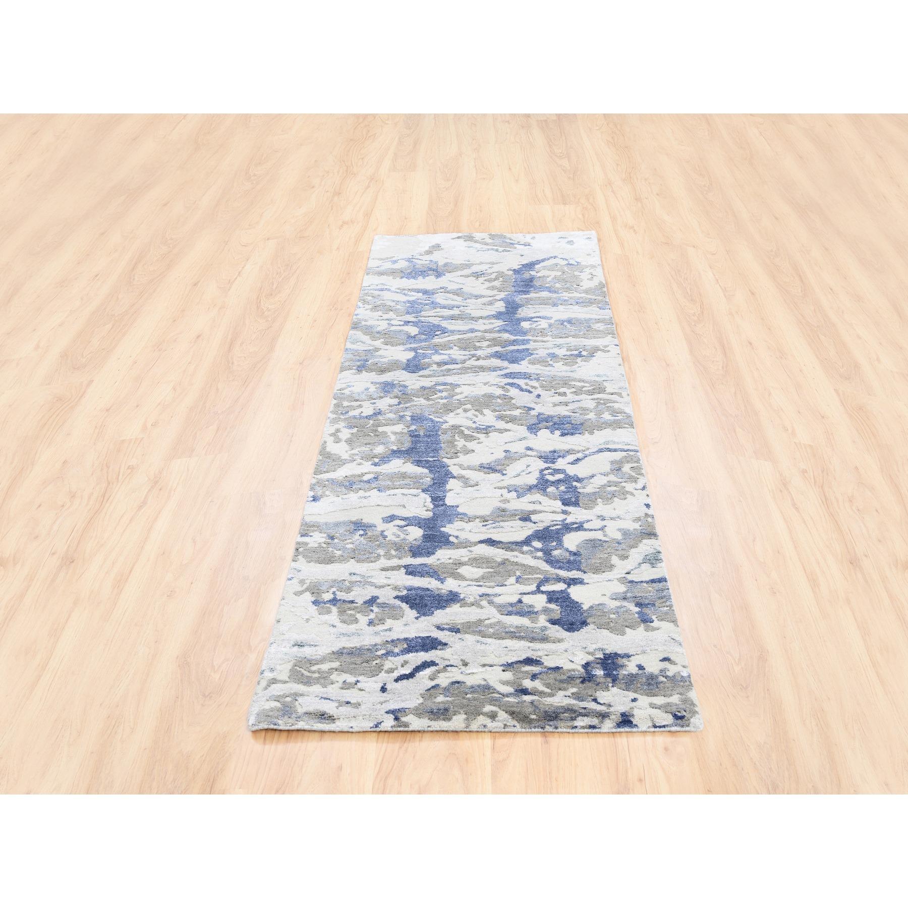 This is a truly genuine one-of-a-kind Beige With Touches Of Blue Modern Wool And Silk Hand Knotted Oriental Rug. It has been Knotted for months and months in the centuries-old Persian weaving craftsmanship techniques by expert artisans.
Primary