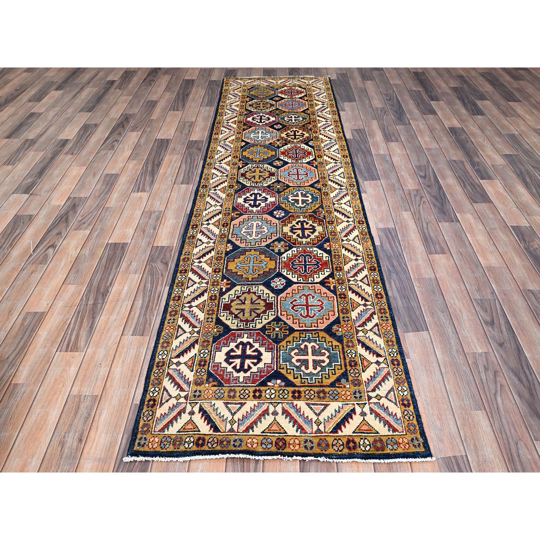 This is a truly genuine one-of-a-kind Special Kazak, Hand Knotted, Pure Wool, Oriental Rug. It has been Knotted for months and months in the centuries-old weaving craftsmanship techniques by expert artisans.
Primary materials: Wool
Latex: No Pile