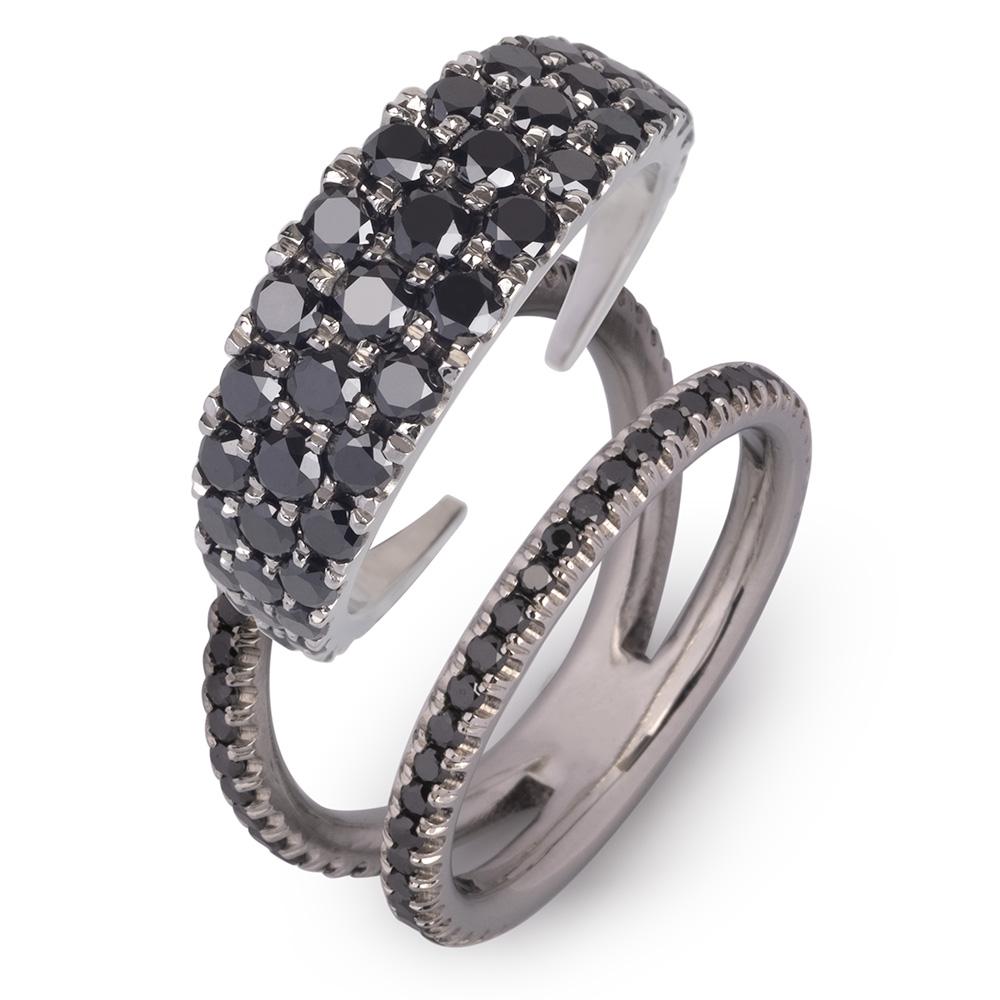 This sparkling black diamond ring has a surprise! It's actually a two-piece interchangeable ring. The wedge inserts into the outside ring and creates endless possibilities. 
The rings are customizable and the combinations you choose will reflect