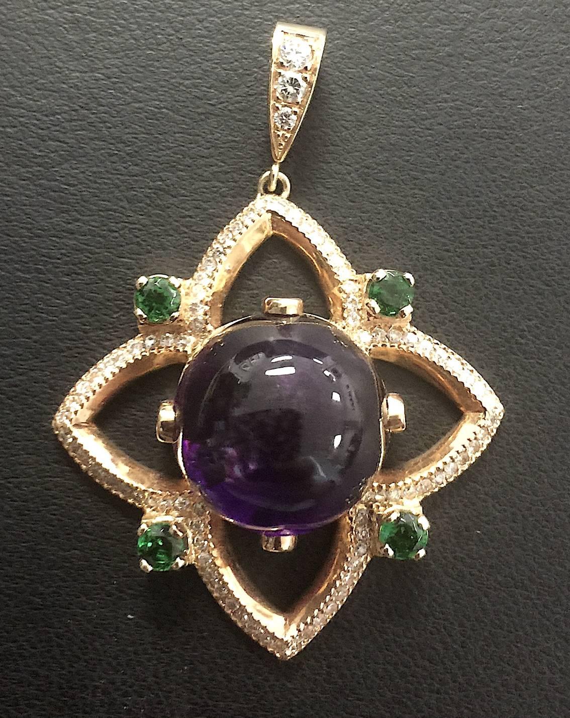 28 Carat Bolivian Amethyst Cabochon Pendant Set in 18K Rose Gold.

This pendant is set in 18k rose gold with a  28 cts. Bolivian amethyst cabochon in center. There is 1 cts. of diamonds and .77 cts. on Tsavorites to accent center stone. The diamonds