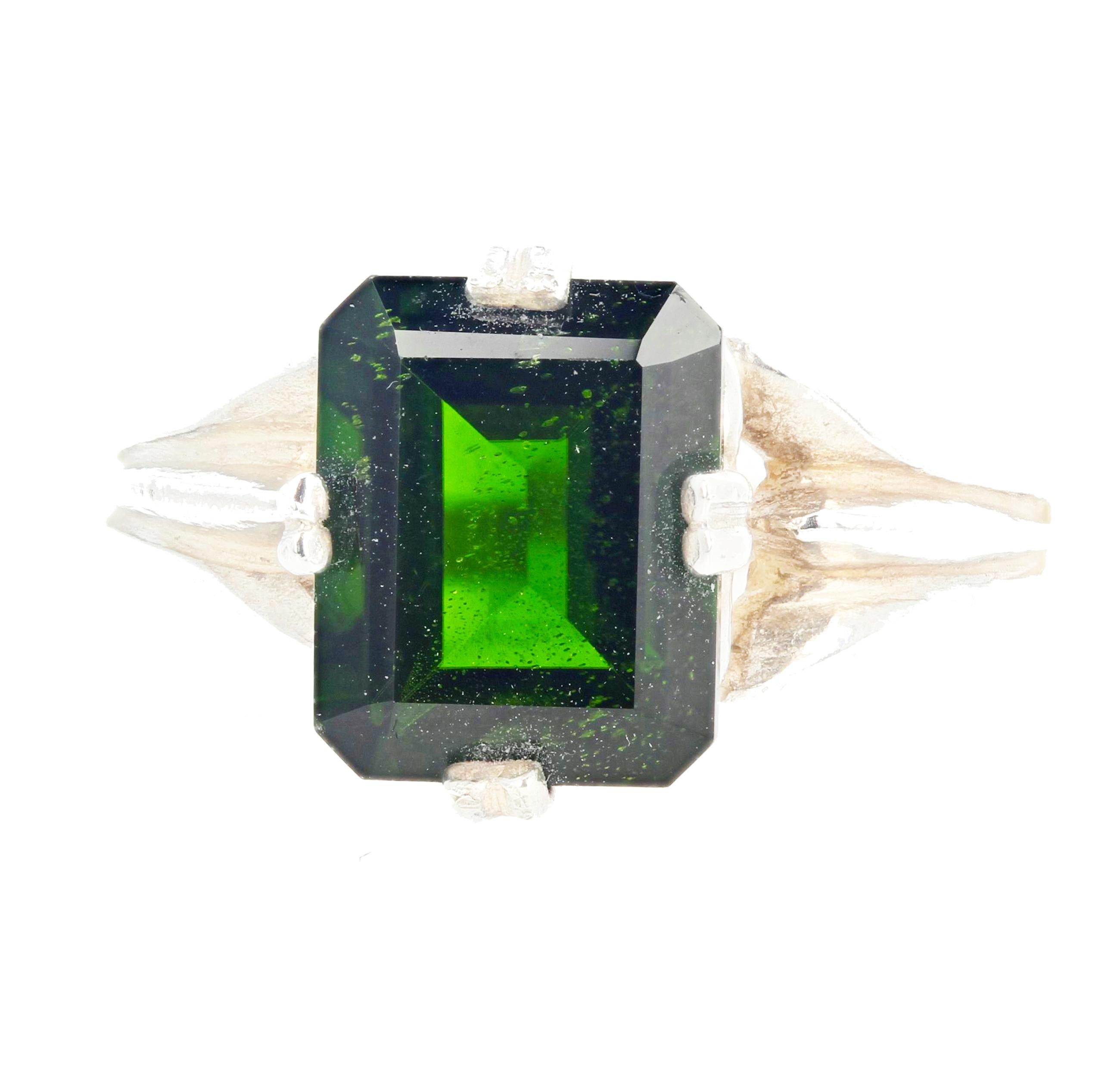 Brilliantly glittering cushion cut 2.8 carat natural Chrome Diopside - 10 mm x 8.1 mm - set in a sterling silver ring size 7 sizable for free.  This glows a bright intense green and is wonderful for day-to-evening occasions.  There are no eye
