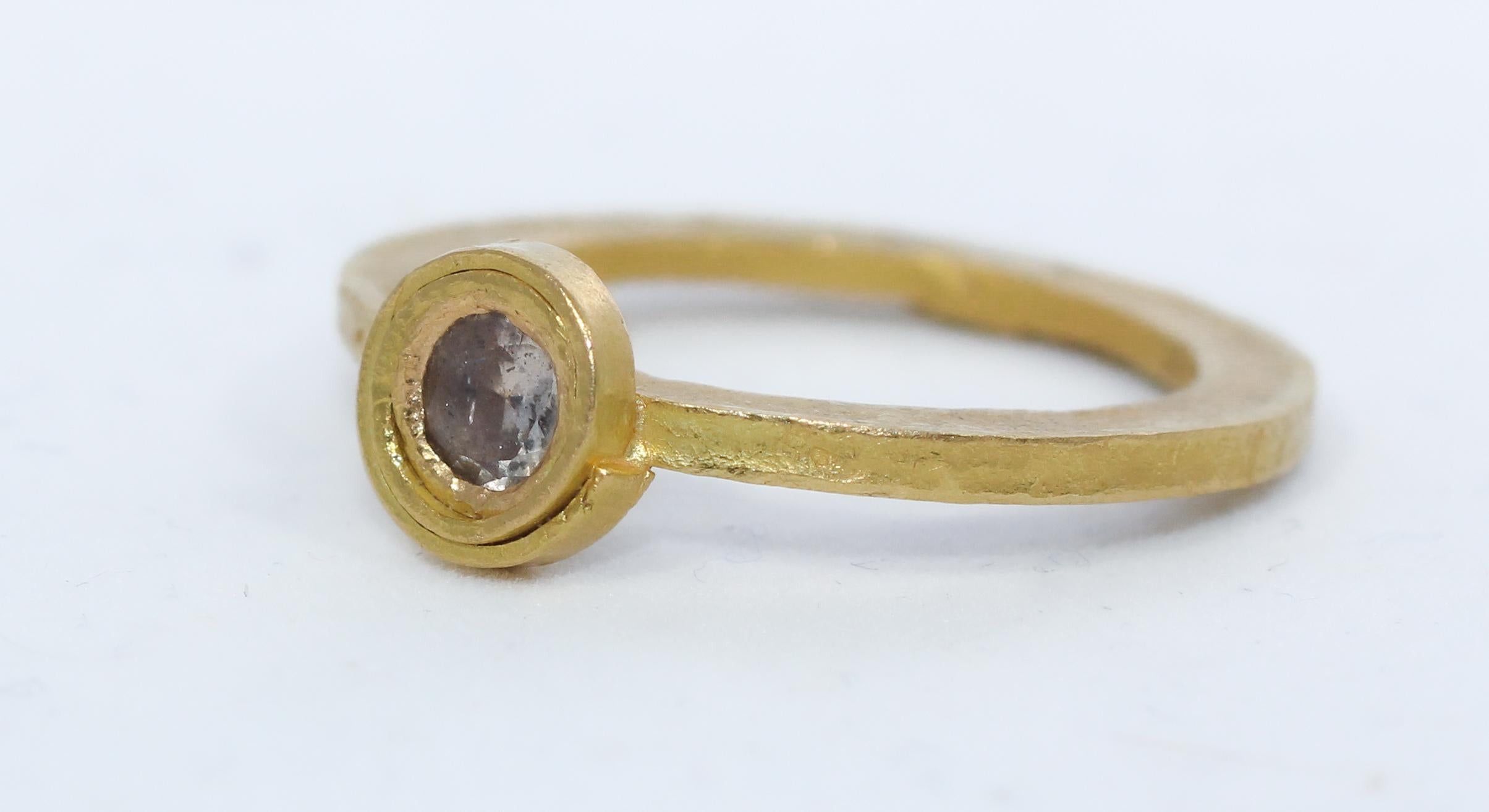 An Alternative Engagement or Bridal handmade diamond stackable ring in a rich colored recycled 22K and 22K gold with brushed hammered finish. .28ct sparkling brown diamond set in an unusual spiral bezel. Sputnik, Simplicity series contemporary ring