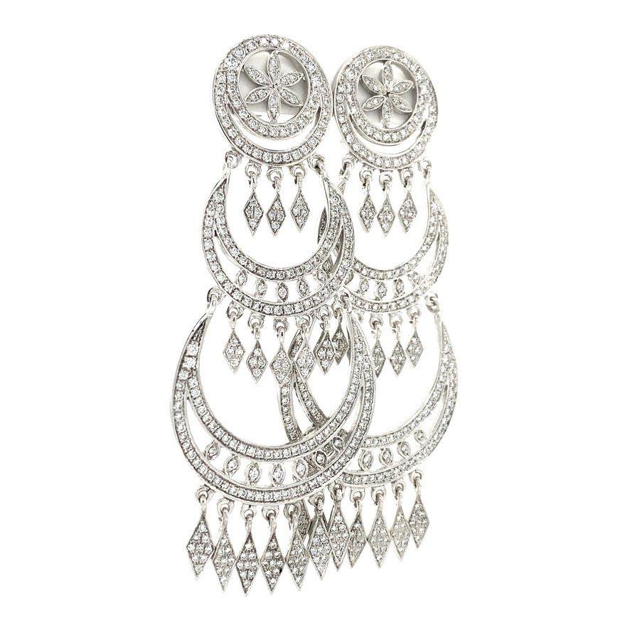 These 18 carat white gold chandelier earrings are set with 560 diamonds of 0.005 carat, brilliant cut. 

Material: White gold
Quality: 18 carat
Stone type: 560x diamond 0.005ct. (2.8ct) brilliant cut G-SI
Width: 17.29 - 29.2 mm
Weight: 29.6